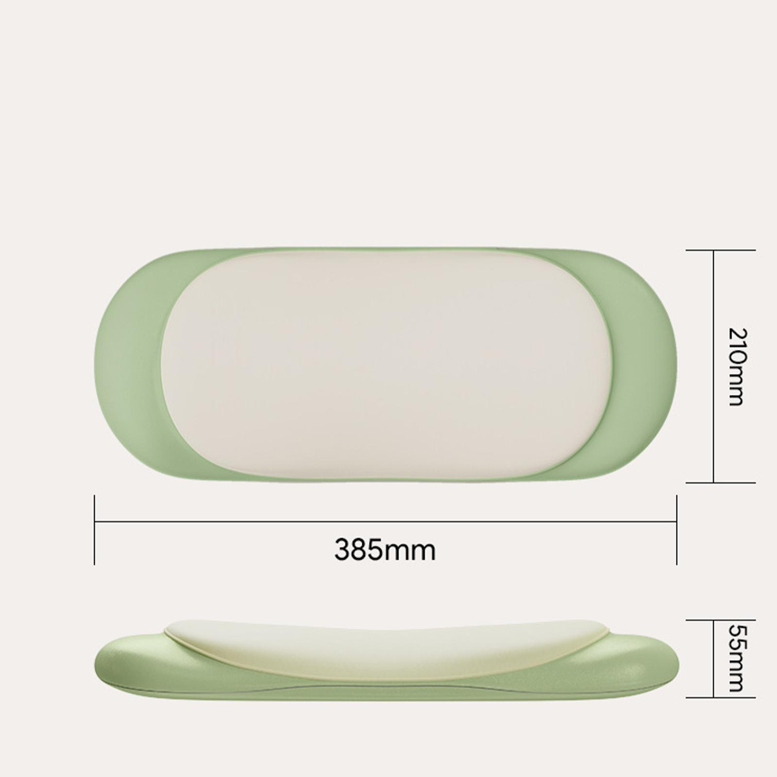 Ein grünes Massagekissen mit Abmessungen. Es ist 385 mm lang und 210 mm breit und 55 mm hoch.