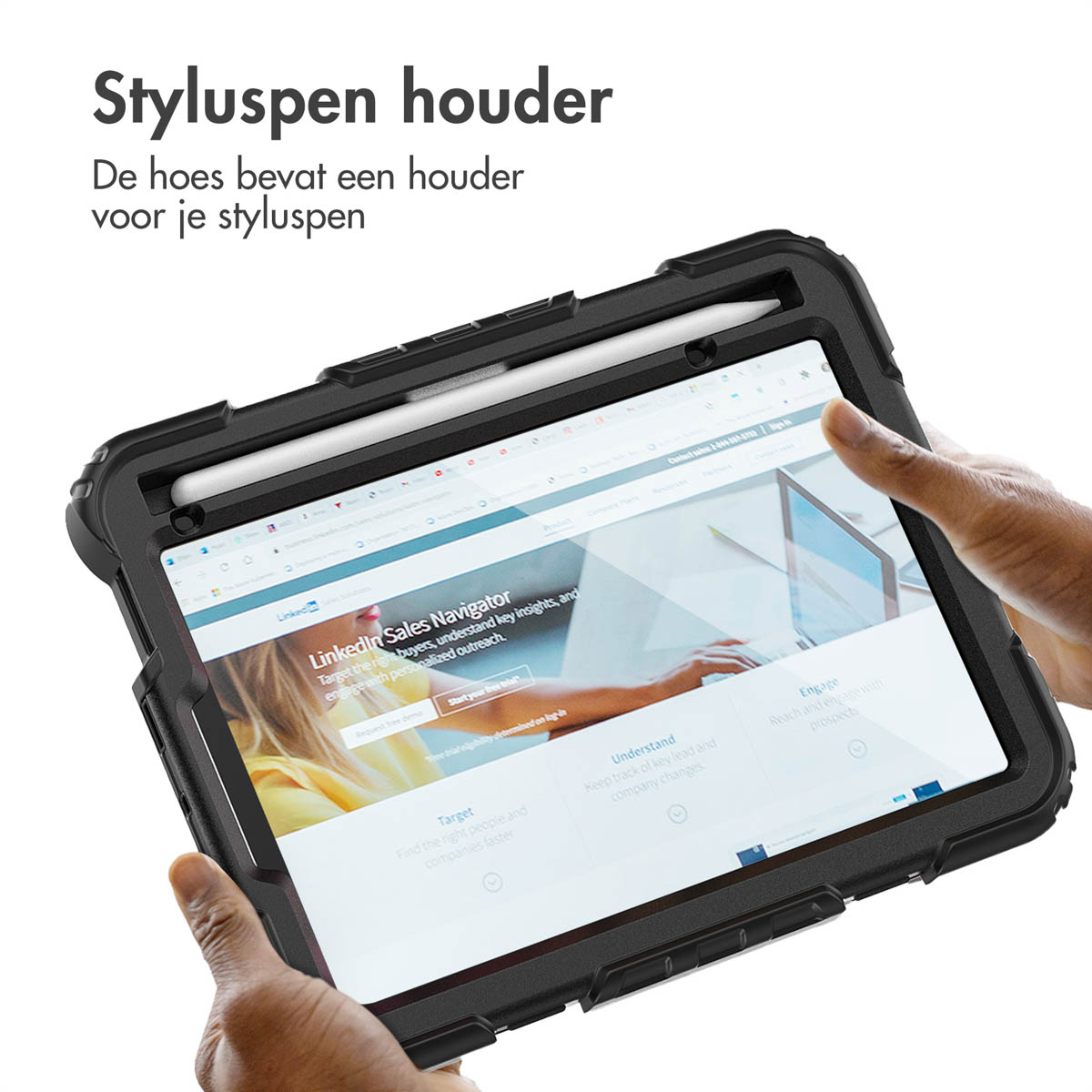 A hand holding a tablet in a black case, with a stylus, showing a LinkedIn webpage. 