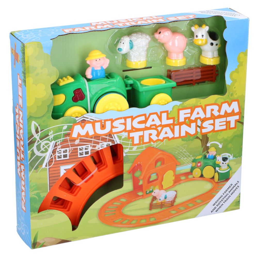 Speelgoedtreinset met boerderijdieren. Groene trein, spoor, boerderijgebouwen, schaap, koe, varken. Doos met tekst.