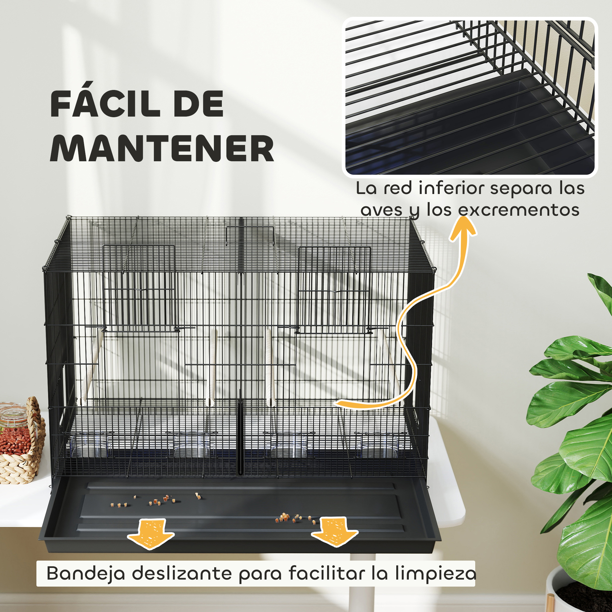 Una jaula negra para pájaros con una bandeja deslizante y una red inferior para facilitar la limpieza.