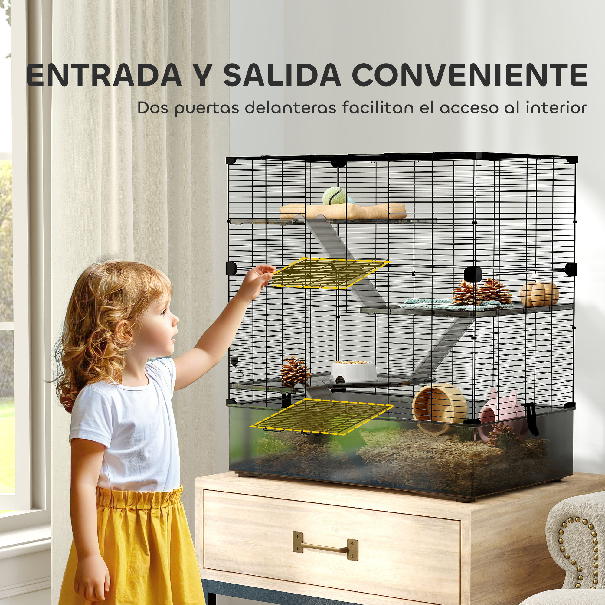 Una niña pequeña alcanza una jaula de hámster negra y transparente, con accesorios y base de madera.
