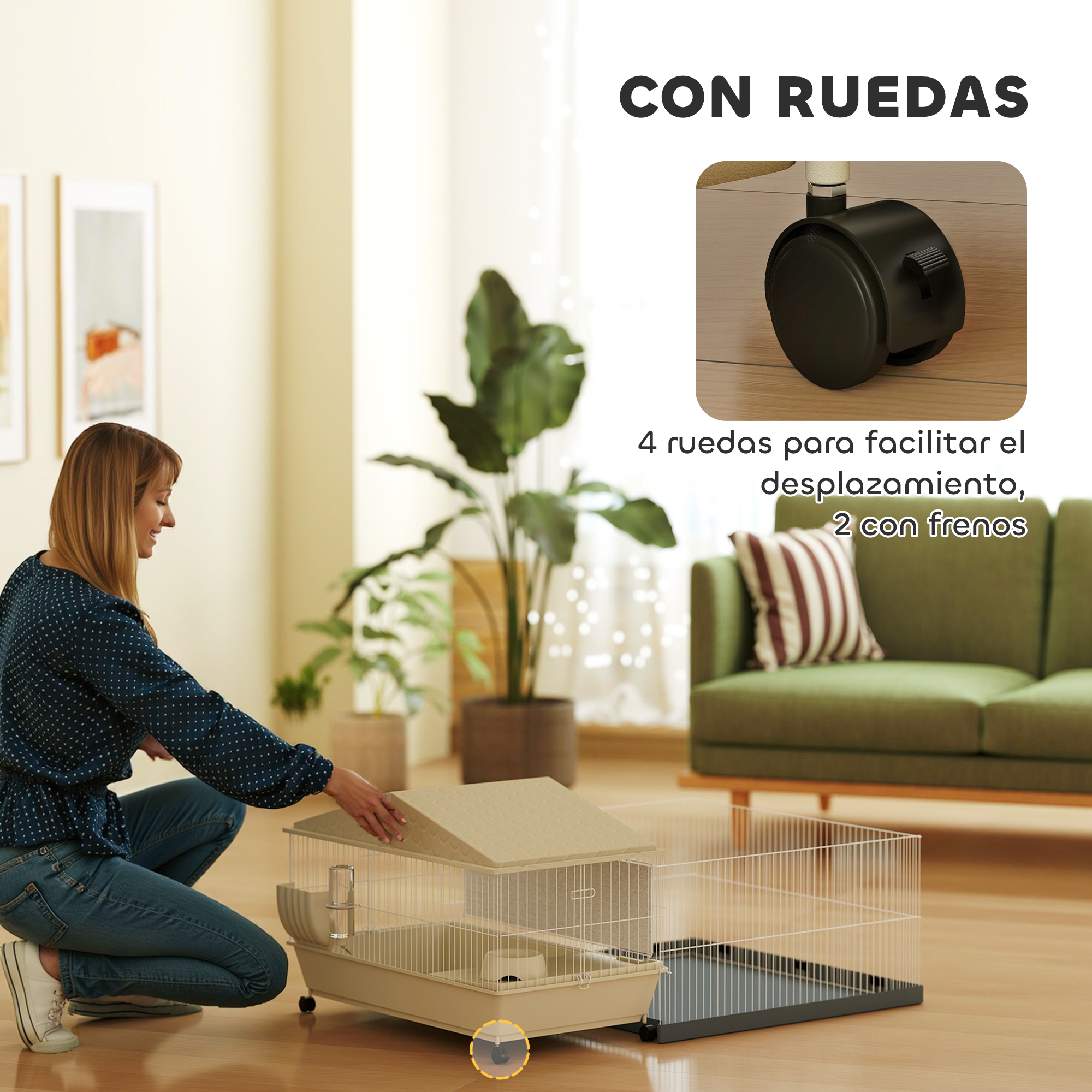 Mujer tocando una jaula de cobayas. La jaula está sobre ruedas. La jaula está junto a un sofá verde.