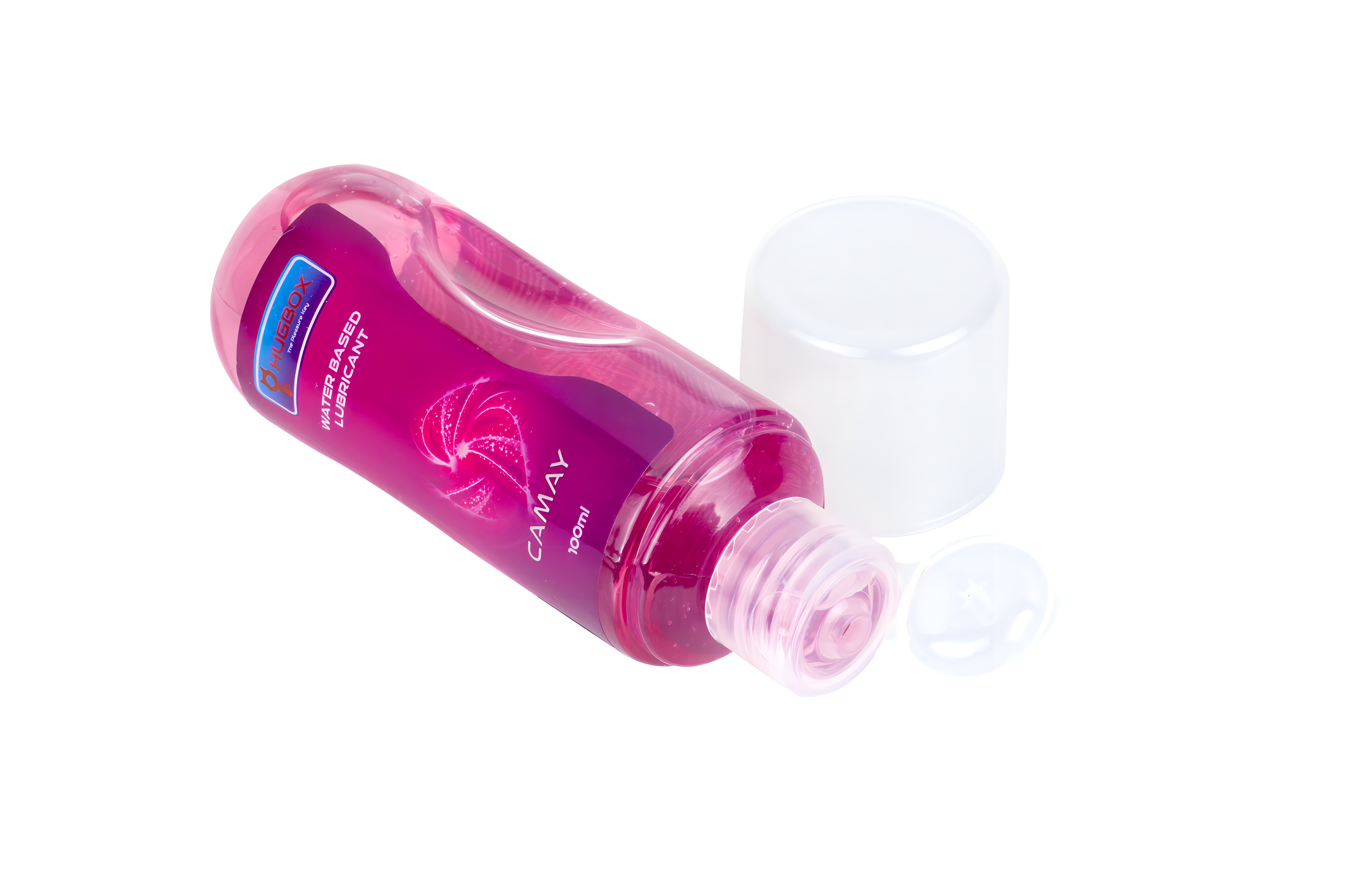 Una botella rosa de lubricante tumbada de lado, sin tapa. La etiqueta dice 'CAMAY'.