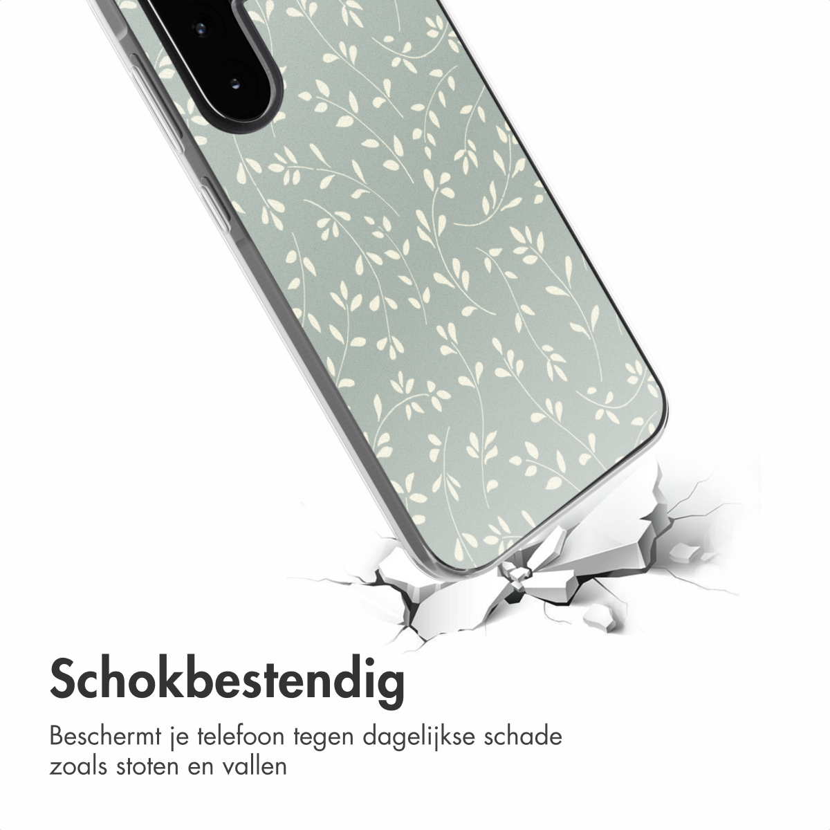 Een telefoonhoesje met een groen bladerpatroon. De hoes is schuin geplaatst, met een gebarsten oppervlak eronder.