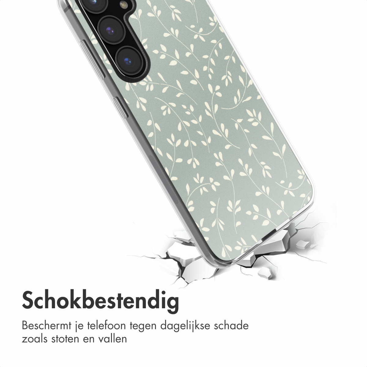 Coque de téléphone avec un motif floral vert clair, tombant sur une surface fissurée.