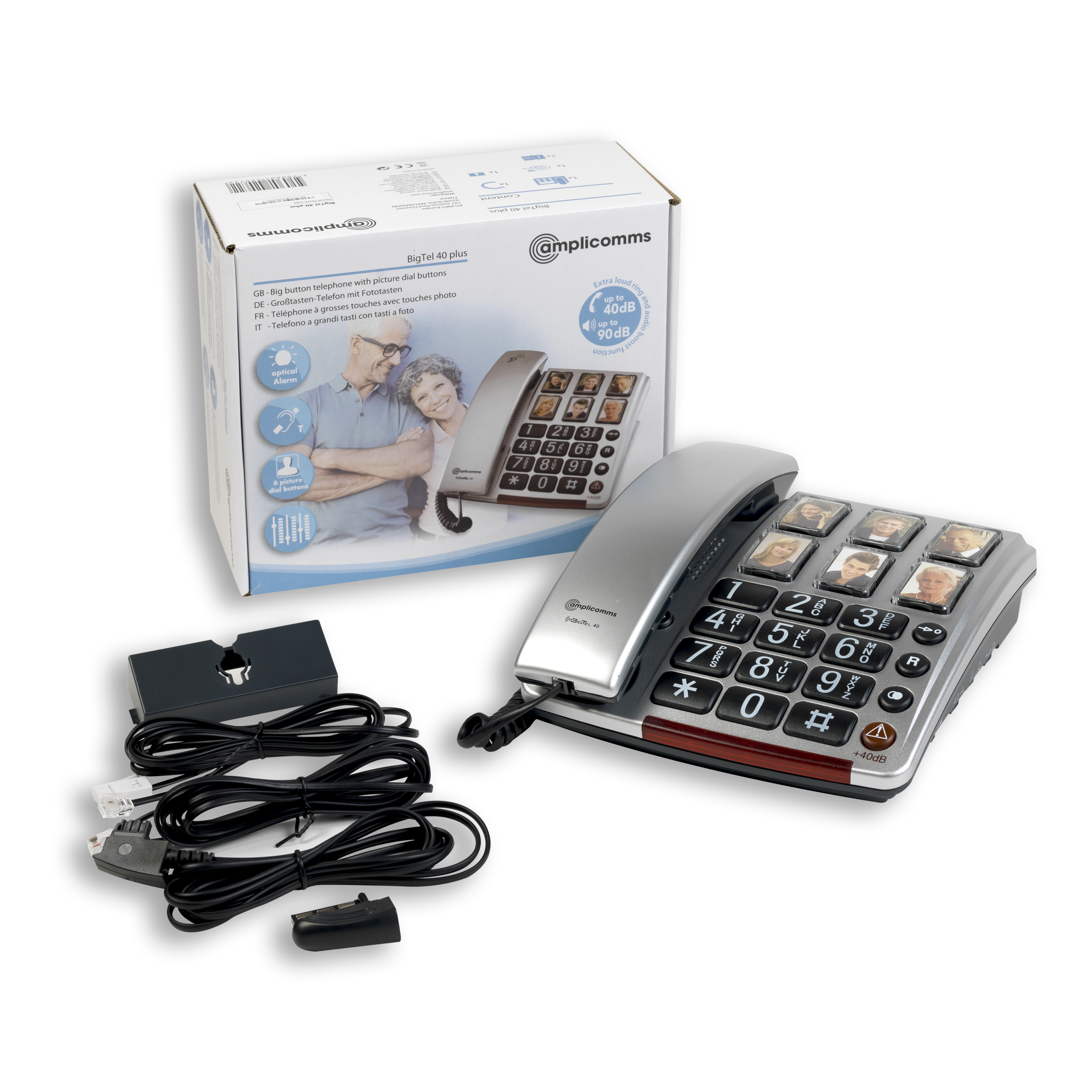 Un telefono con tasti grandi con foto di persone sui tasti, con la sua scatola e accessori su una superficie bianca.
