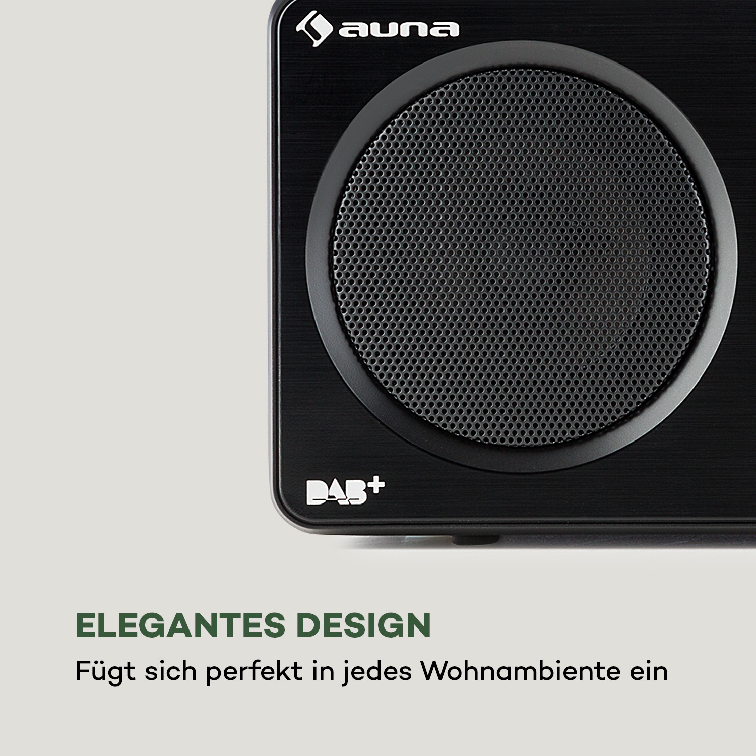 Nahaufnahme eines schwarzen Lautsprechers mit einem Netzgitter. Der Text lautet „Elegantes Design“.