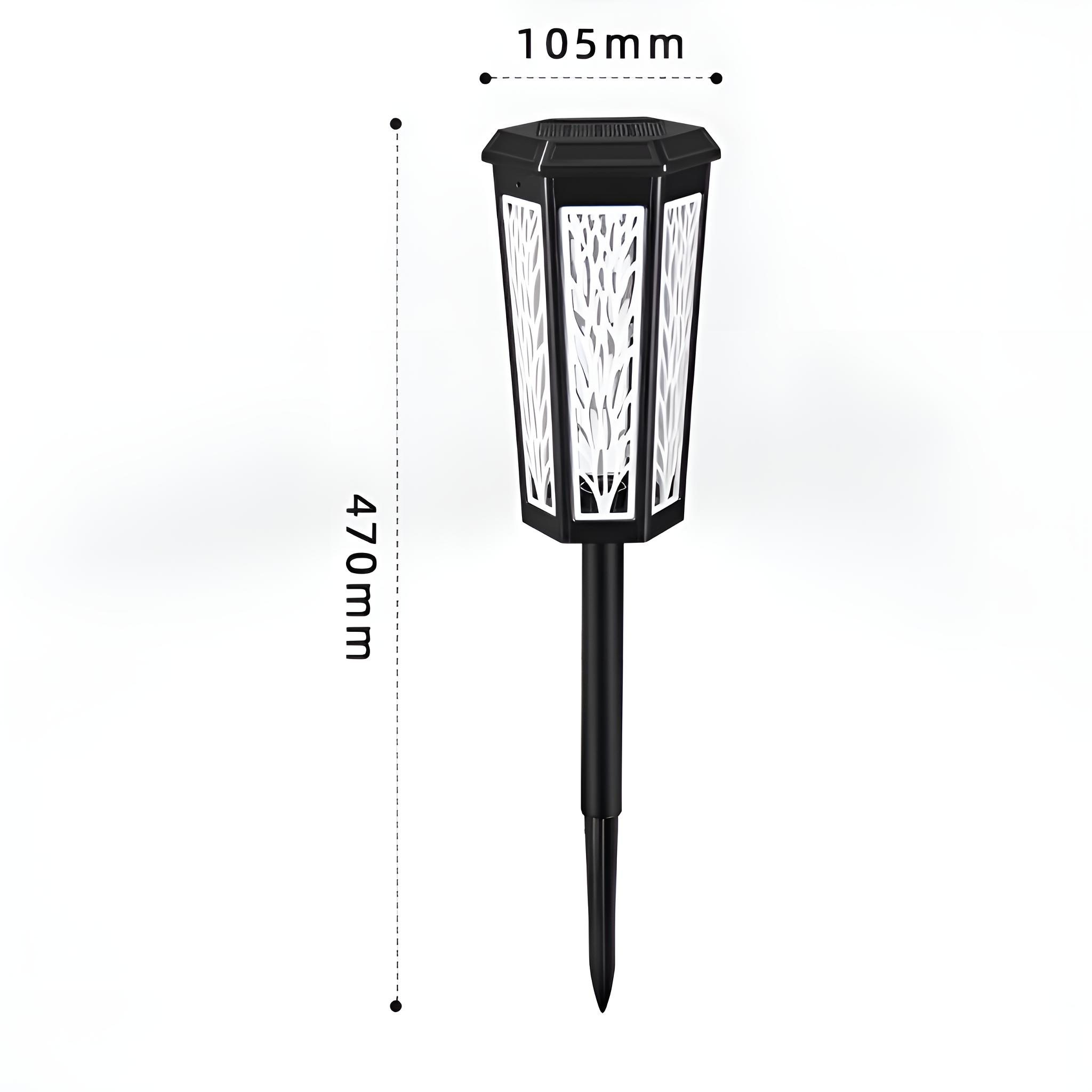 Schwarze Solar-Gartenleuchte. Sie hat ein dekoratives weißes Muster und einen Pfahl.