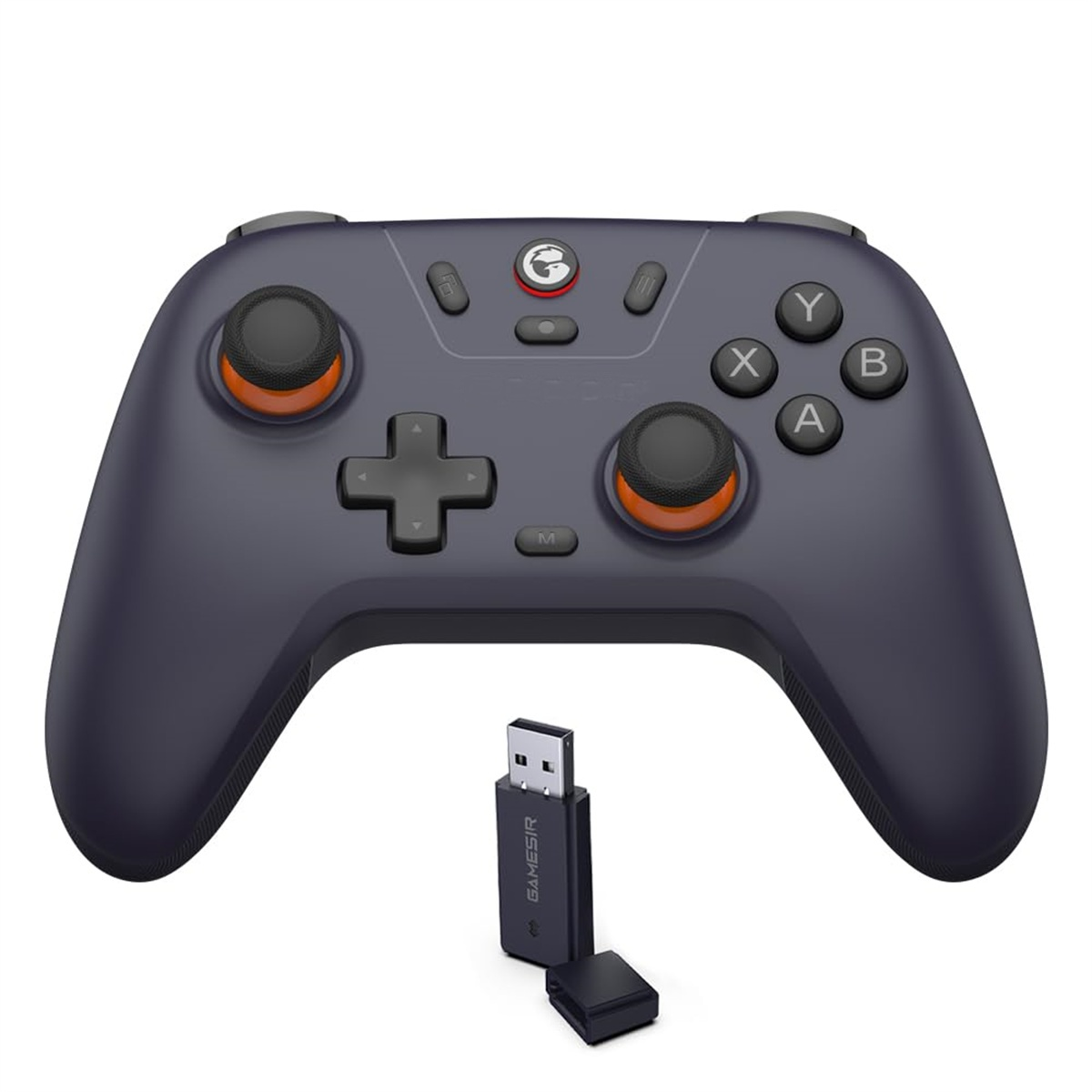 Ein schwarzes Gamepad mit orangefarbenen Akzenten und einem USB-Empfänger. Das Gamepad liegt auf einer weißen Oberfläche.