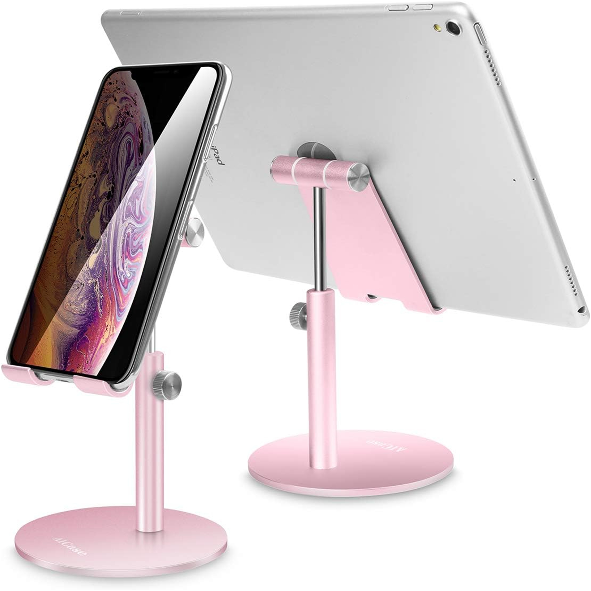 Pinkfarbene Handy- und Tablet-Ständer. Ein Telefon und ein Tablet liegen darauf. Weißer Hintergrund.