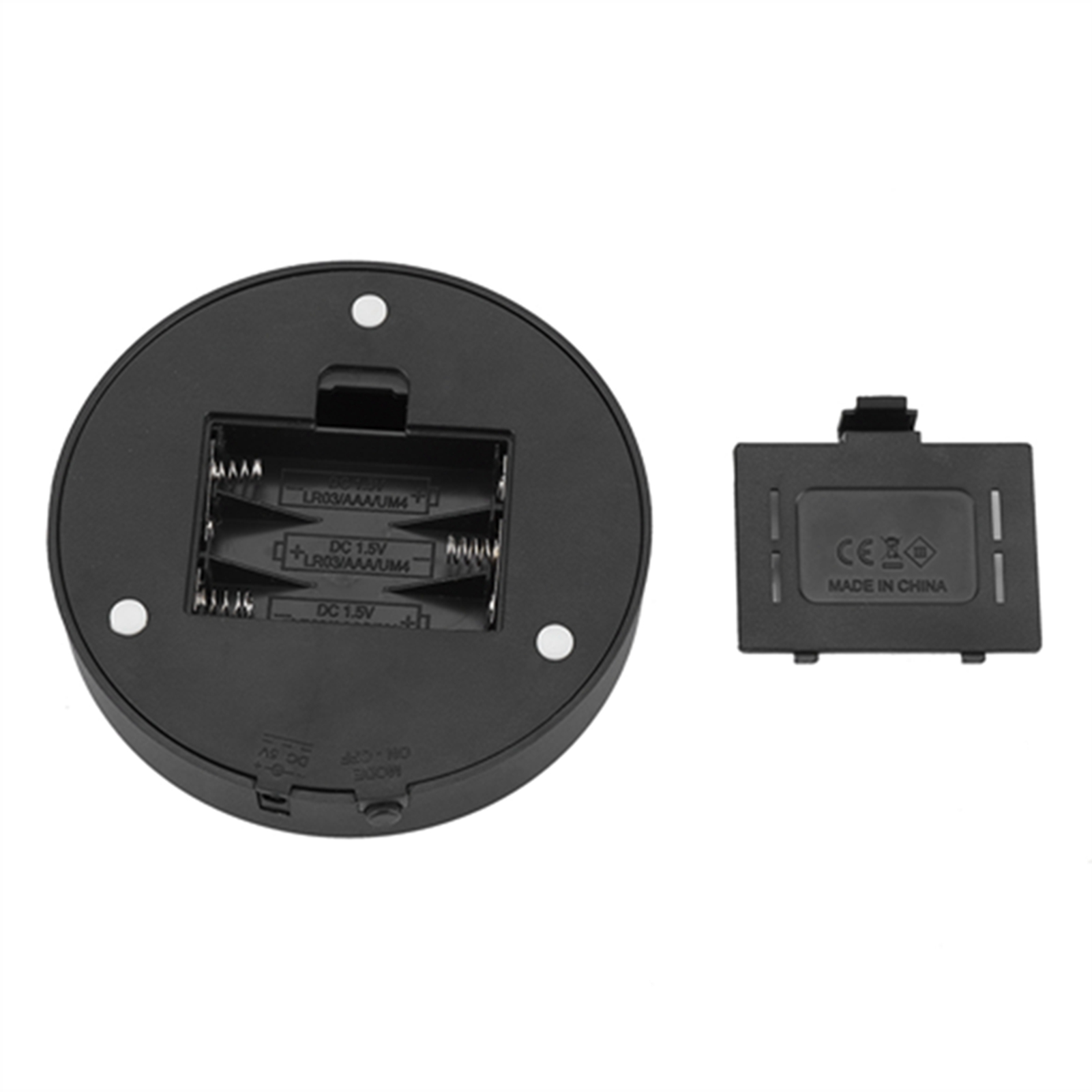Schwarze runde Basis mit 3 Batterien, einer Batterieabdeckung und 3 wei ßen Schraubenlöchern.