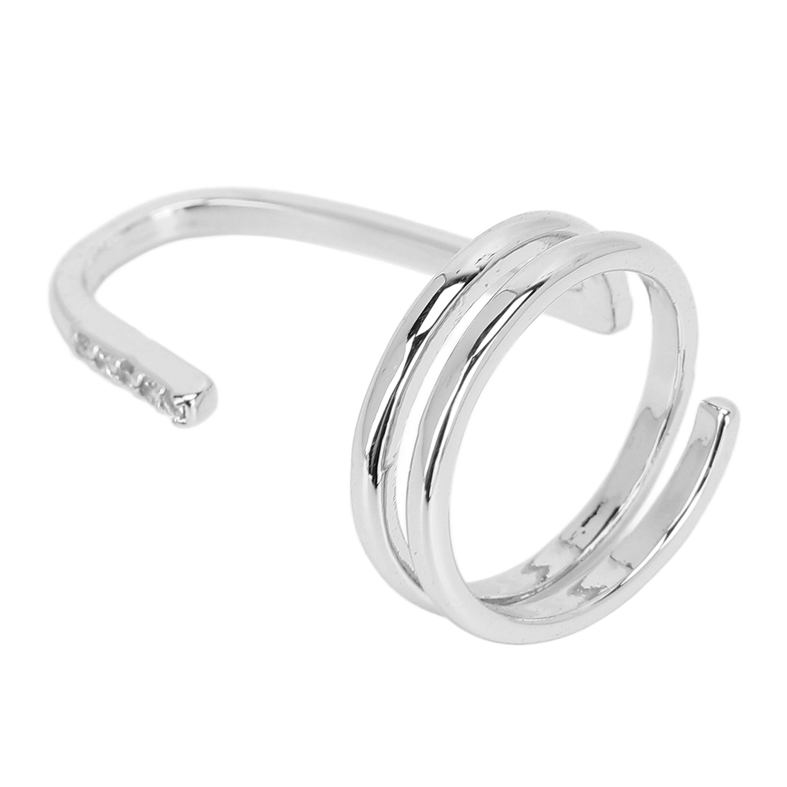 Silberner Nagelkunstring mit Edelsteinen. Der Ring vor weißem Hintergrund.
