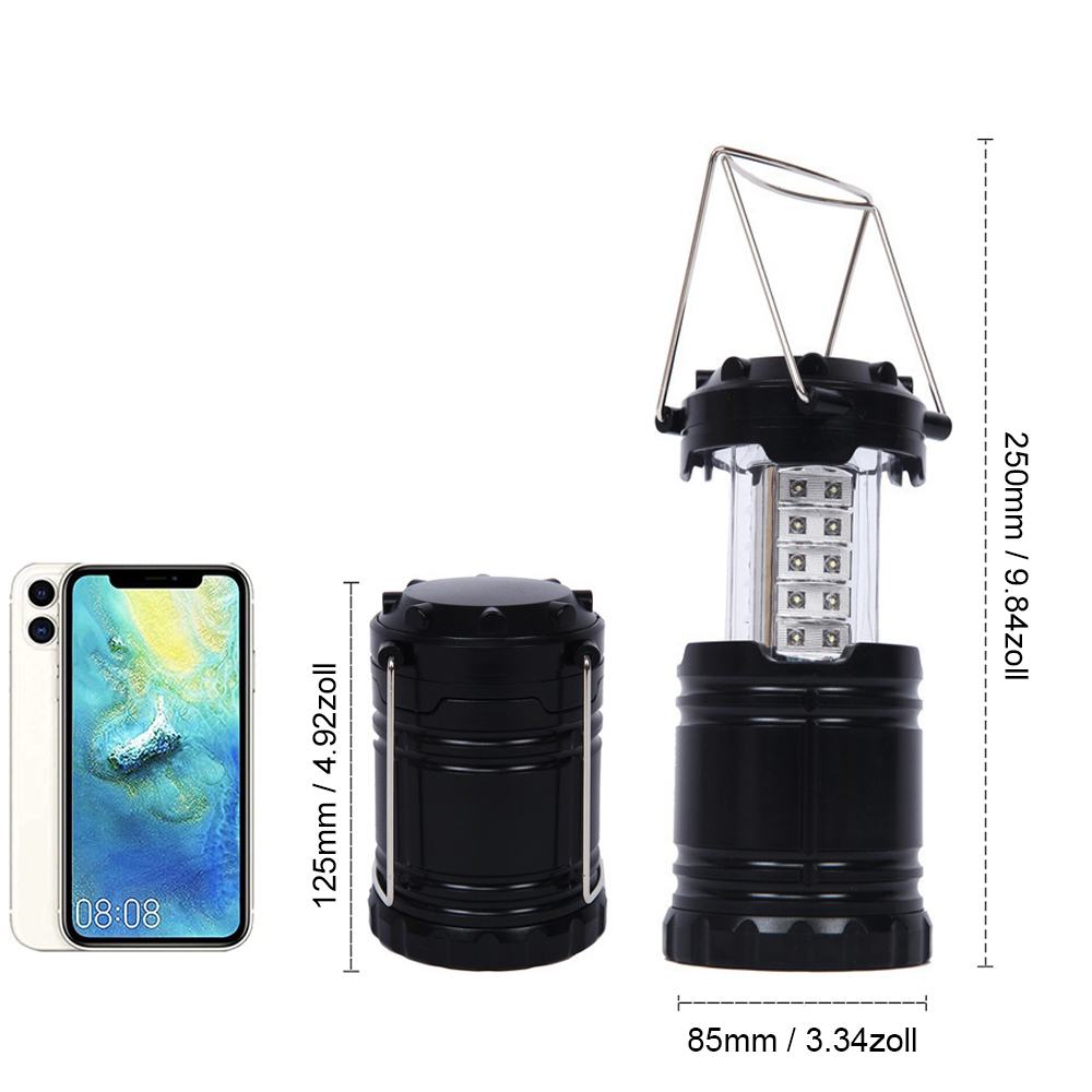Schwarze Laterne mit Abmessungen und ein Smartphone, das den Größenvergleich zeigt.