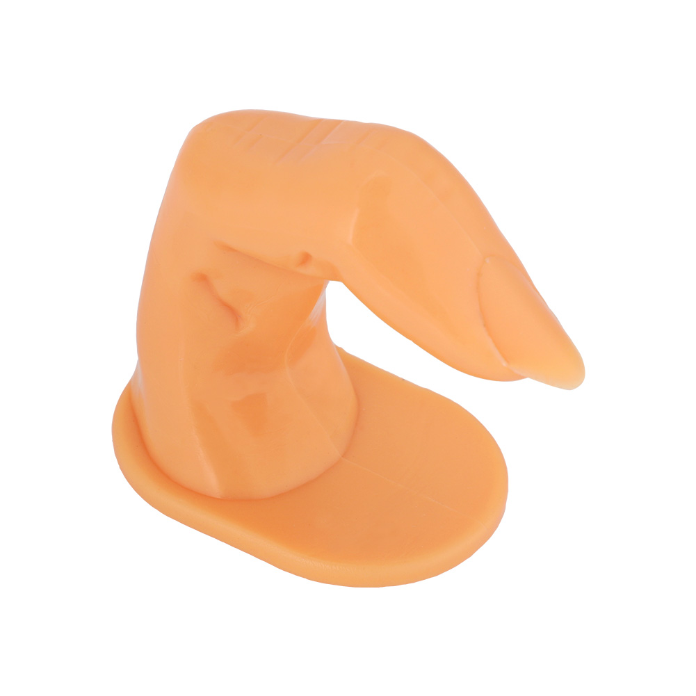 Ein orangefarbenes Kunststoff-Fingermodell, von einem Winkel aus betrachtet, zeigt die Seite und den Fingernagel.