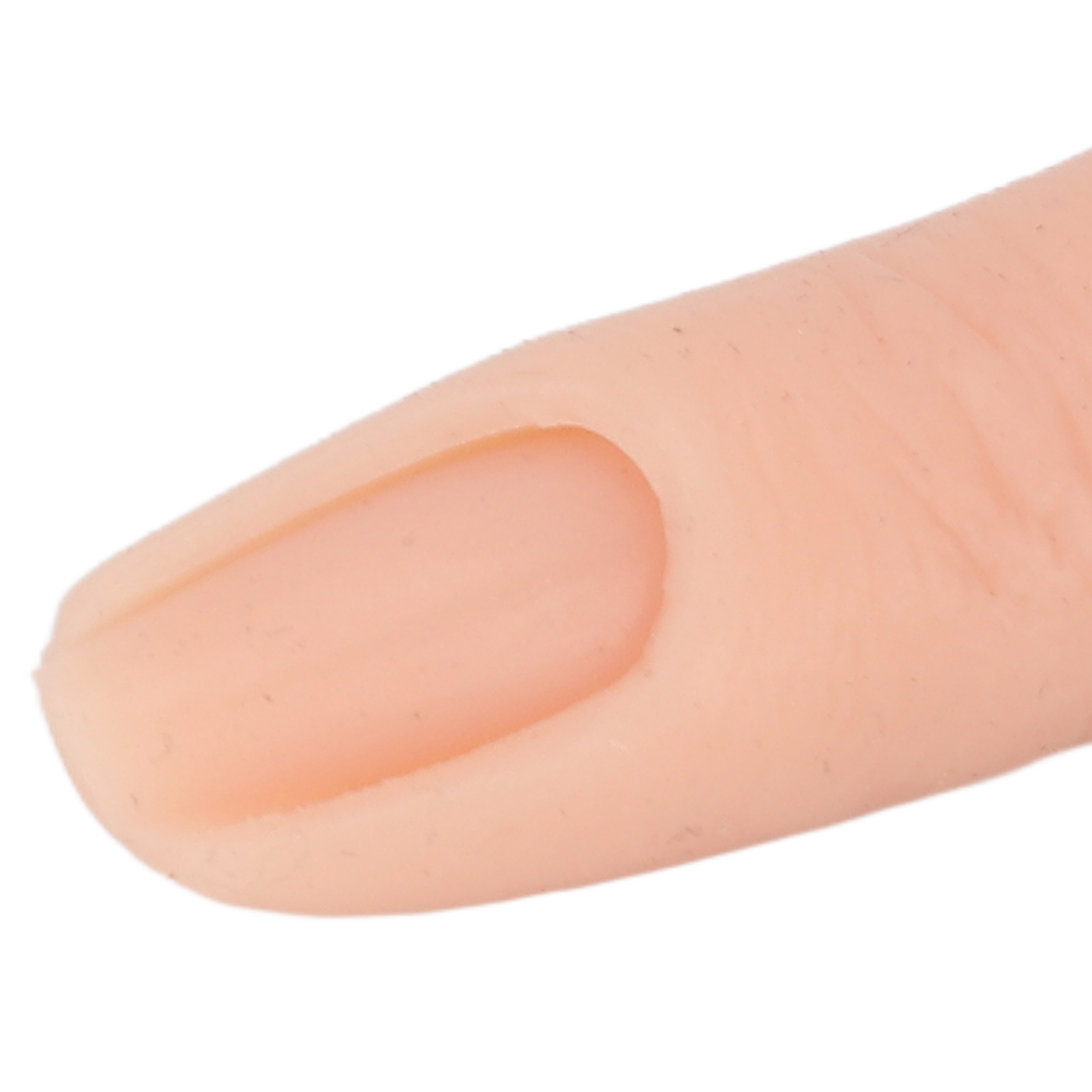 Nahaufnahme eines Fingerprothesen, blassrosa, mit einem gebogenen Nagelbett.