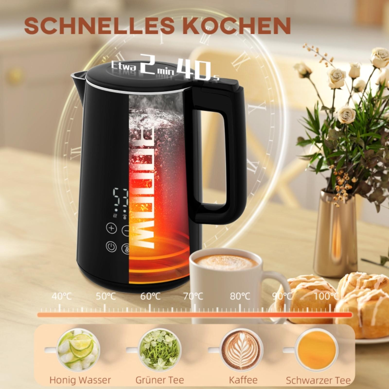 Ein elektrischer Wasserkocher mit einer Tasse Kaffee und Gebäck.