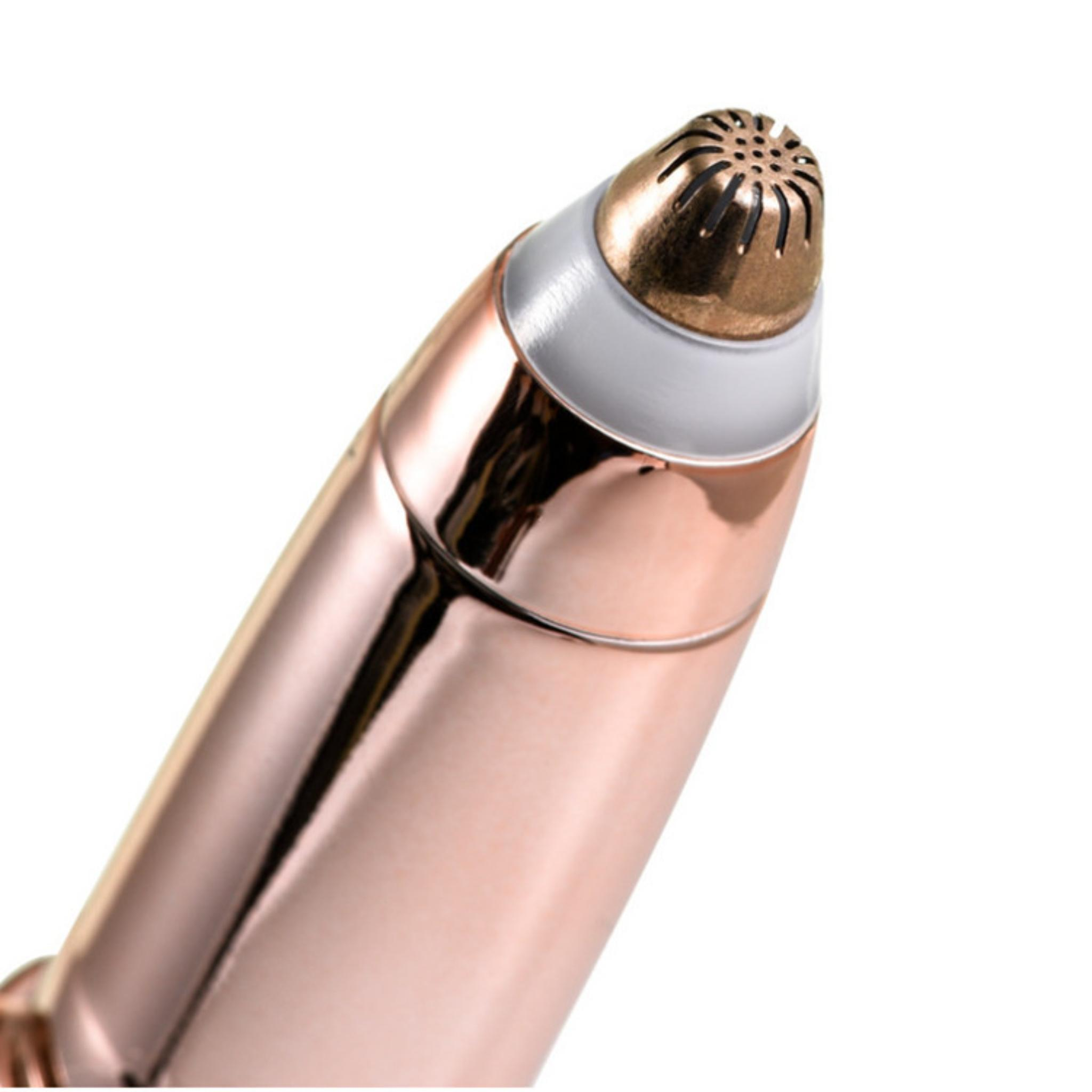 Nahaufnahme des Kopfes eines Augenbrauentrimmers. Er ist roségoldfarben mit einem silbernen Ring und einer kleinen goldenen Öffnung.