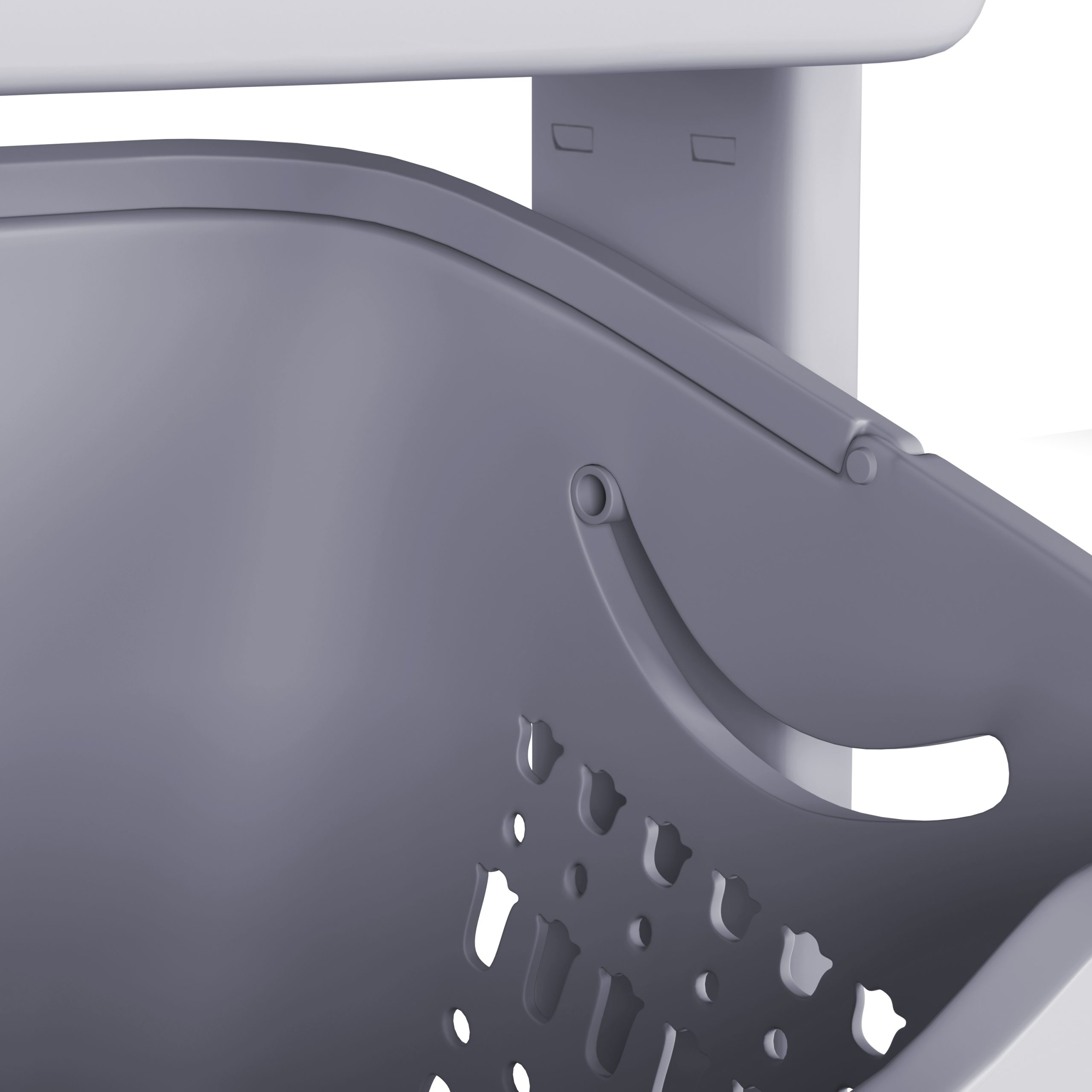 Close-up van een hoek van een grijze wasmandwagen. De wagen heeft een geperforeerd ontwerp.