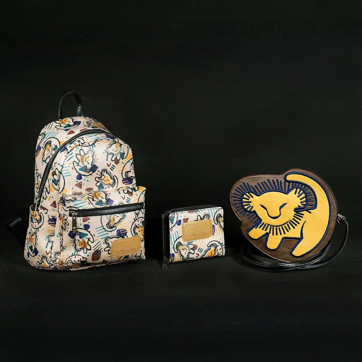 Conjunto de mochila, cartera y bolso temáticos de El Rey León.