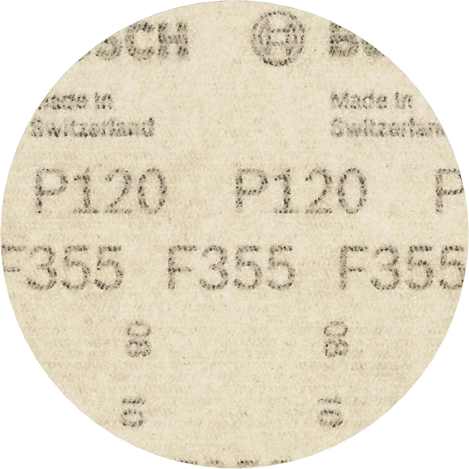Primo piano di un disco di carta vetrata con marcature P120 e F355, che mostra i grani abrasivi sulla superficie.