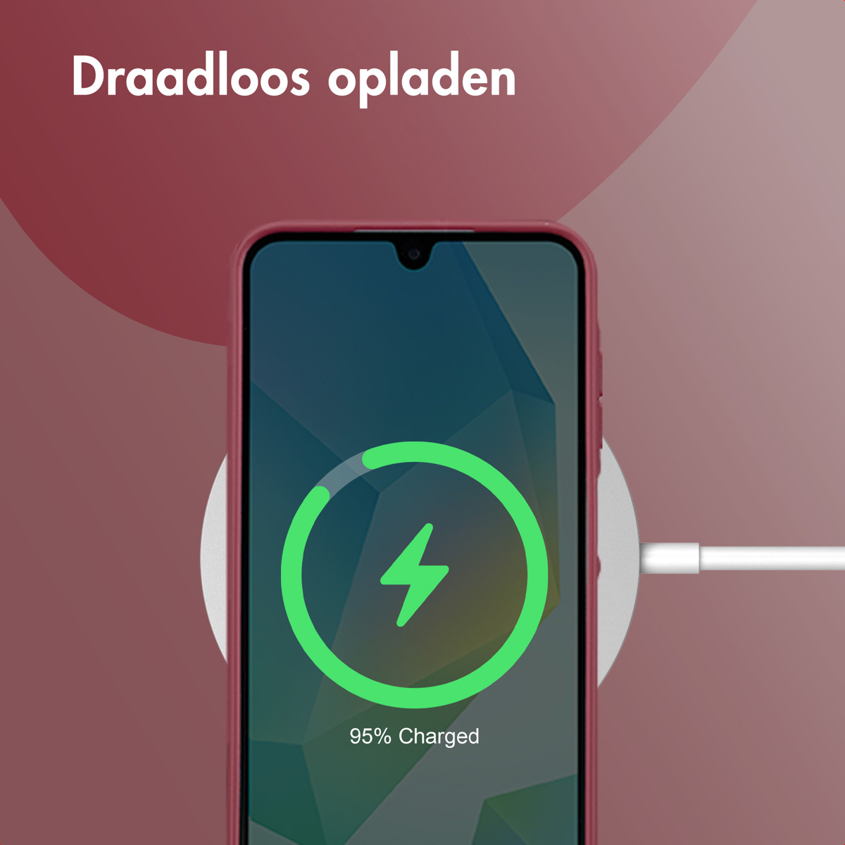 Phone charging on a white pad. The phone screen shows charging and is 95%.