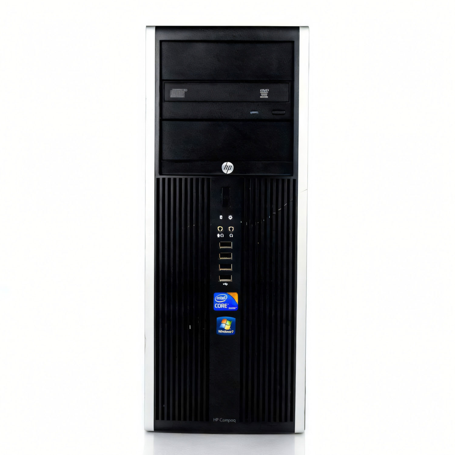 Torre de computadora HP Compaq negra y plateada. Tiene una unidad de DVD, una pegatina de Intel Core y el logotipo de Windows 7.