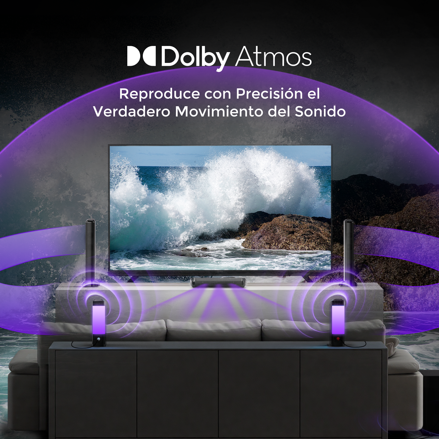 Una sala de estar con TV, barras de sonido y barras de luz. Se ve un sofá y una vista al océano.