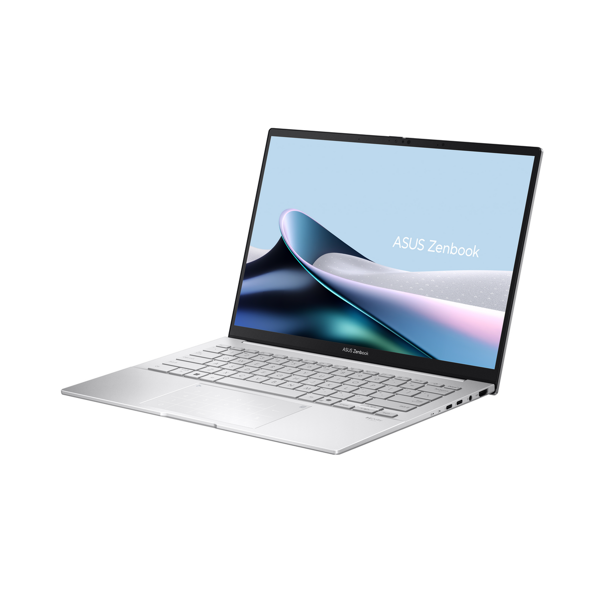 Laptop plateado, abierto, pantalla ASUS Zenbook muestra un patrón azul claro/morado.