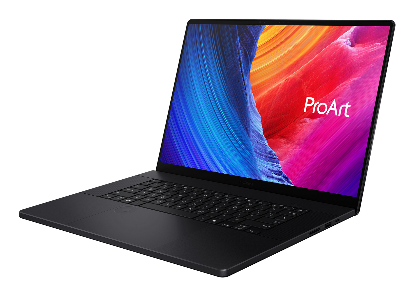 Laptop: ASUS ProArt, negro, abierto. Pantalla muestra arte colorido. Teclado y logo visibles.