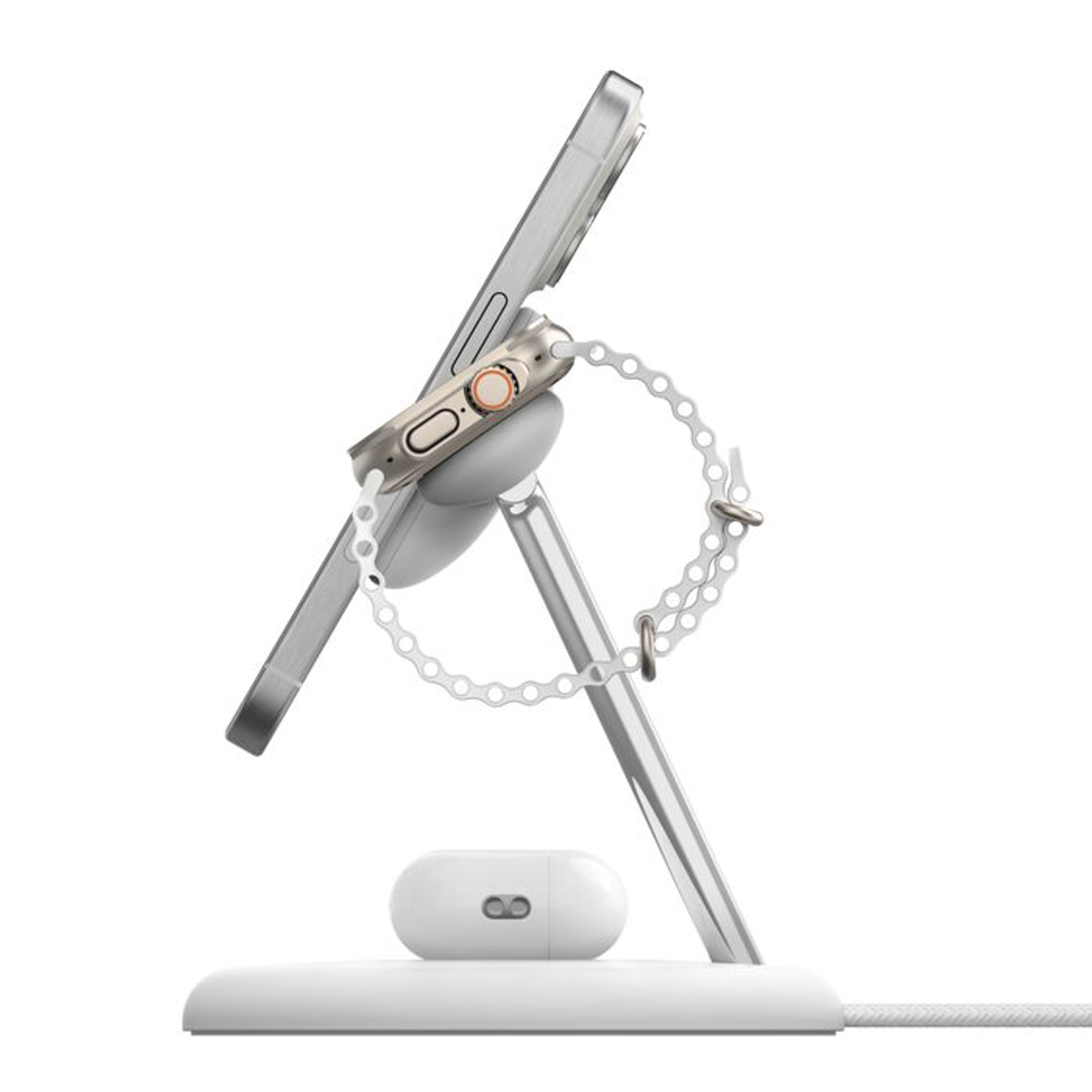 Supporto caricatore per telefono e orologio bianco con telefono e orologio. Il cinturino dell'orologio è bianco e l'orologio è dorato.