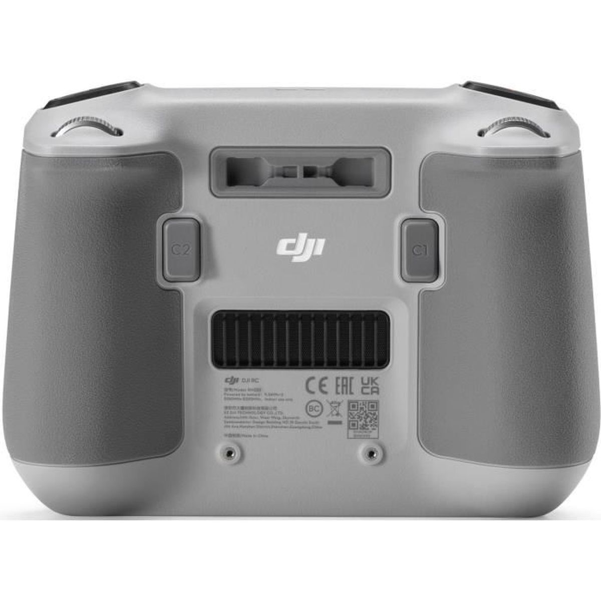 Controlador de drones DJI. Gris y blanco con botones y puertos.