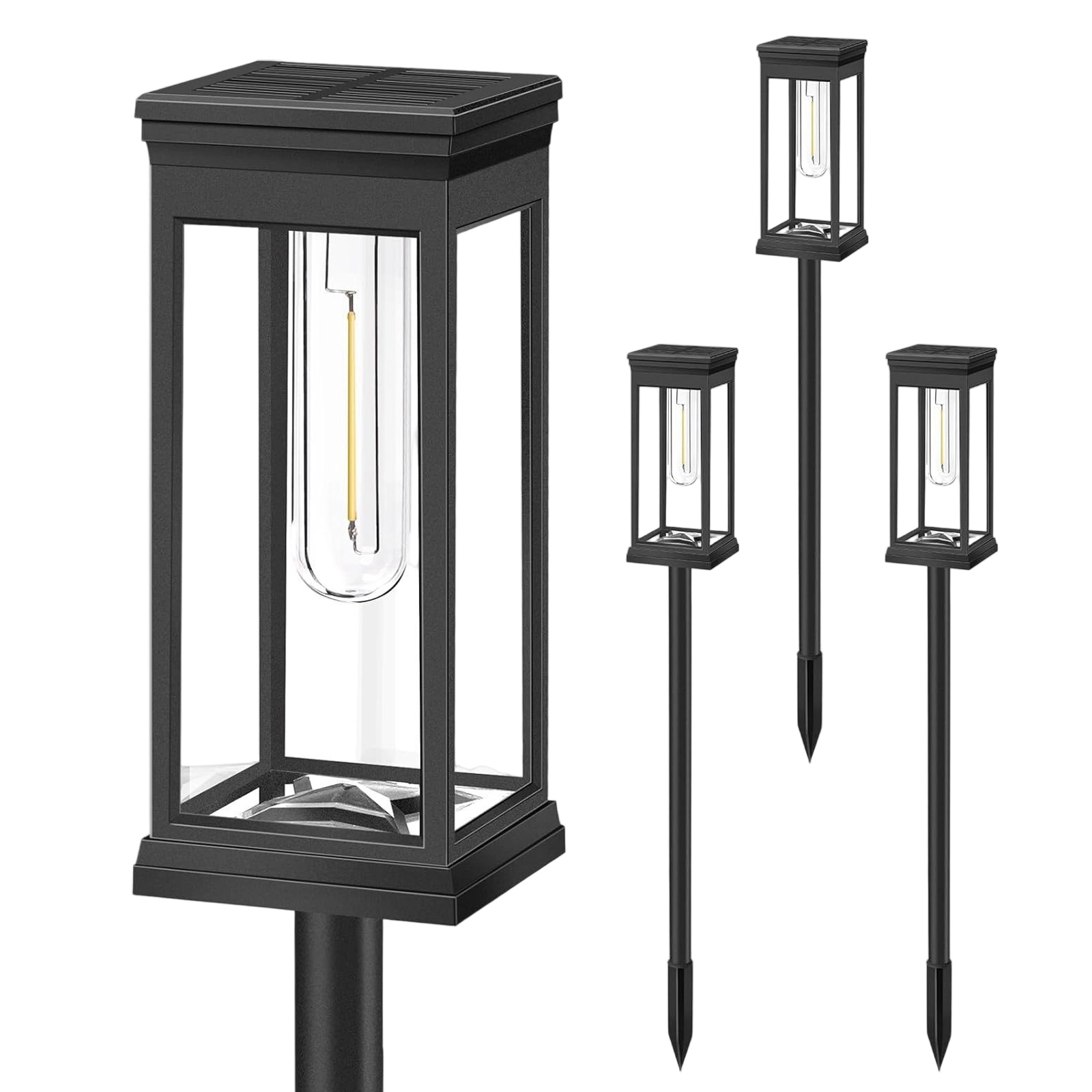 Vier schwarze Solarleuchten für den Außenbereich mit klarem Glas und gelber Glühbirne.