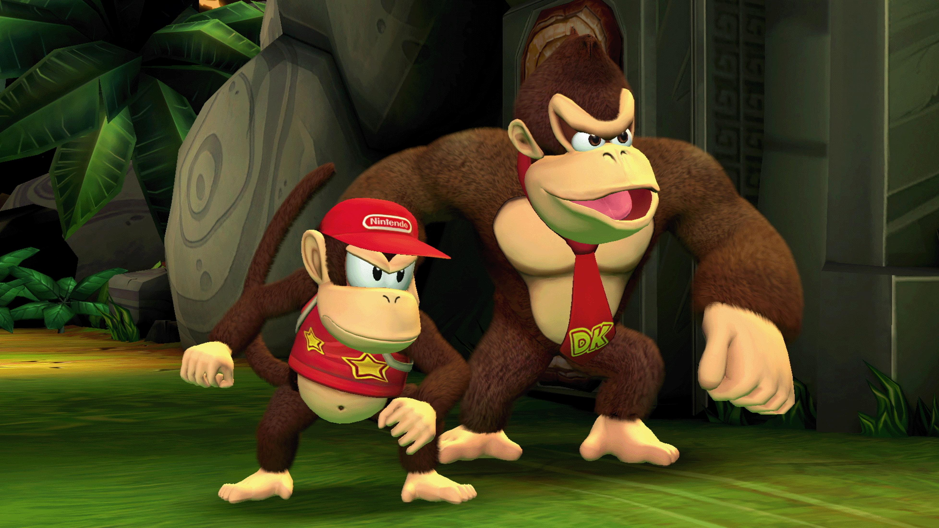 Donkey Kong e Diddy Kong in un ambiente giungla. DK ha una cravatta rossa, Diddy un cappello rosso.