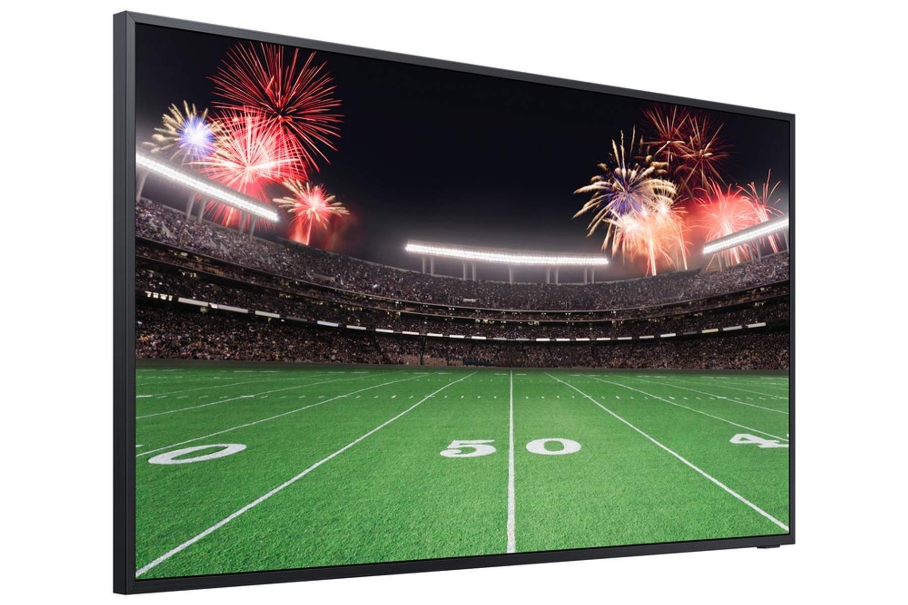 Telewizor wyświetla boisko do piłki nożnej, stadion i fajerwerki. Telewizor ma czarną ramkę.