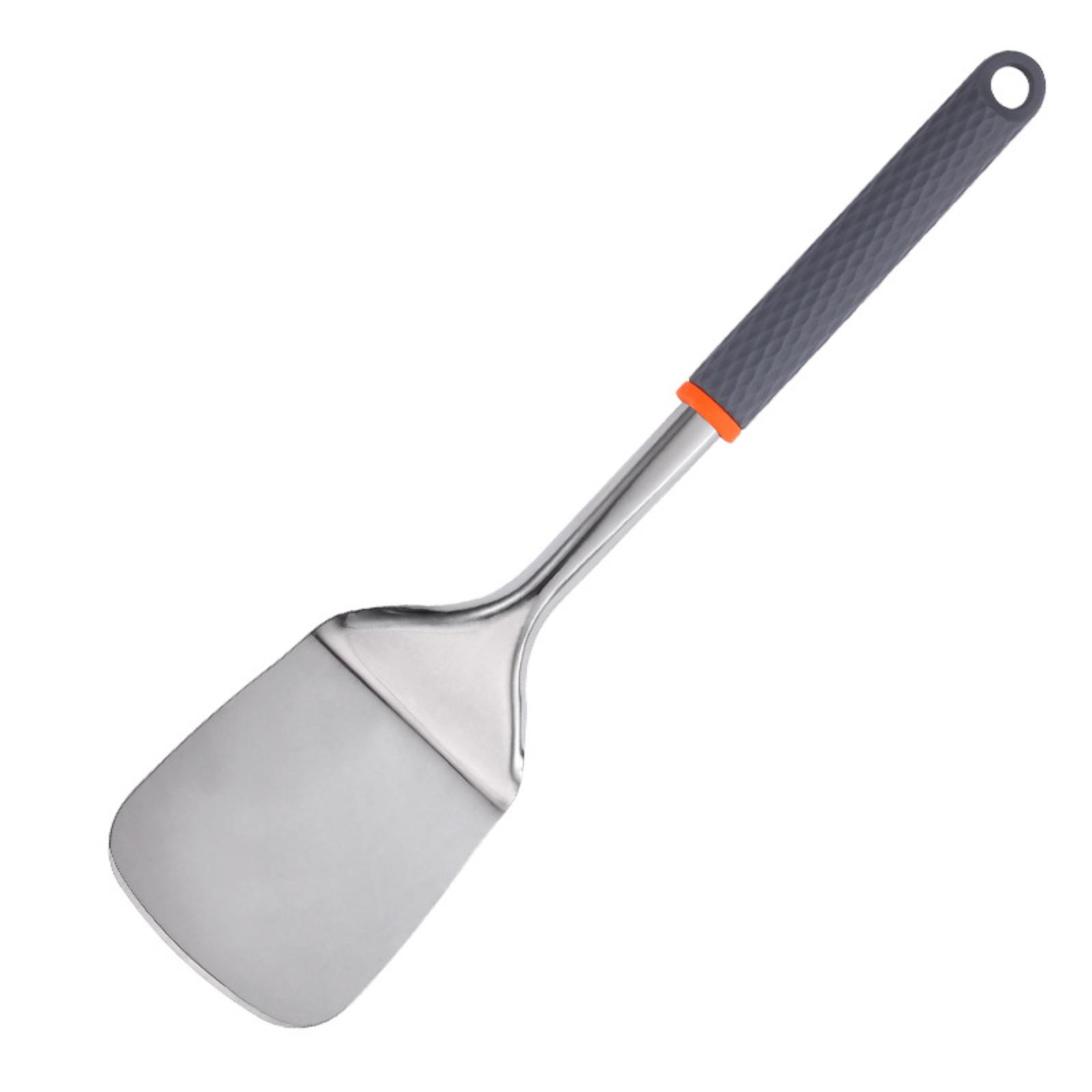 Edelstahl-Pfannenwender mit grauem Griff und orangefarbenem Akzent, auf weißem Hintergrund.
