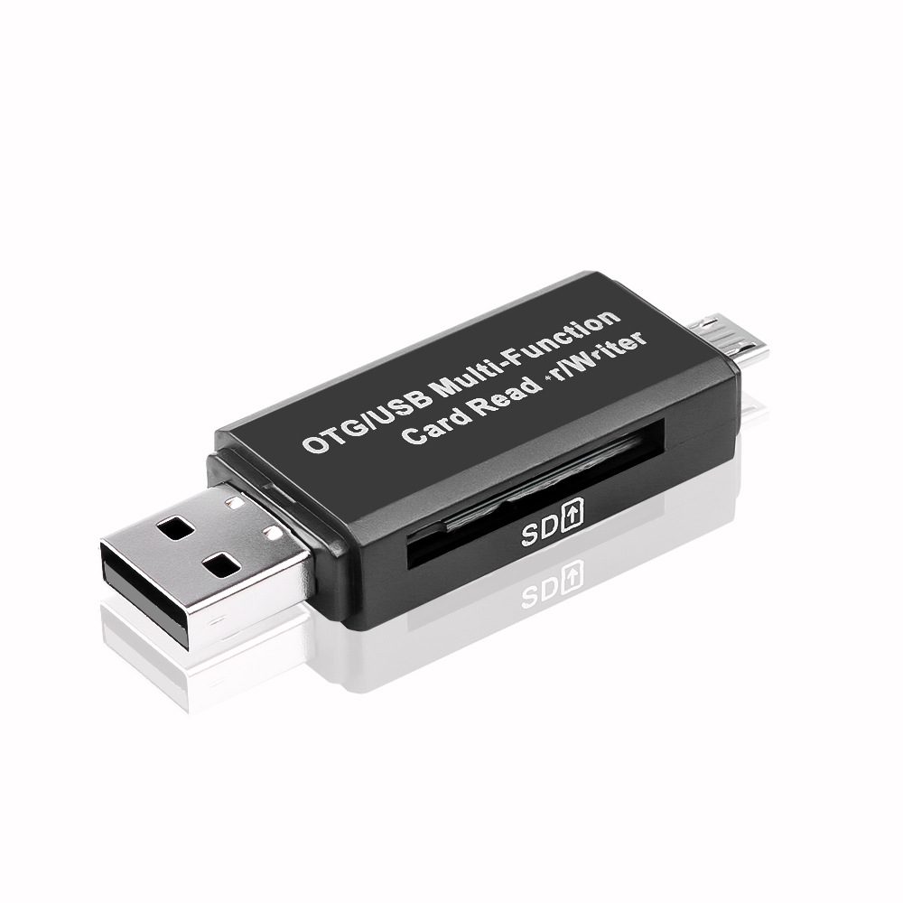 Un lettore di schede multifunzione OTG/USB nero. Ha uno slot per schede SD e un connettore USB.