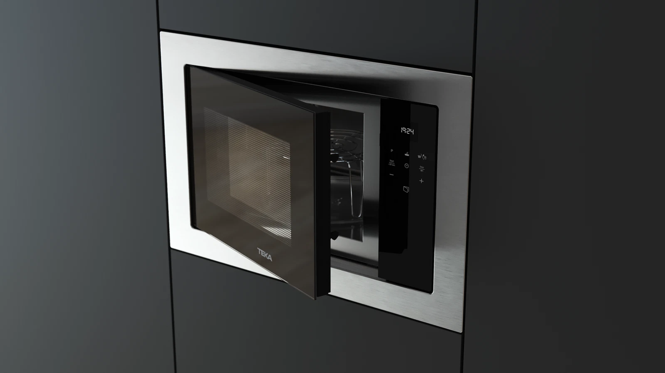 Forno a microonde ad incasso con la porta parzialmente aperta, mostrando l'interno.