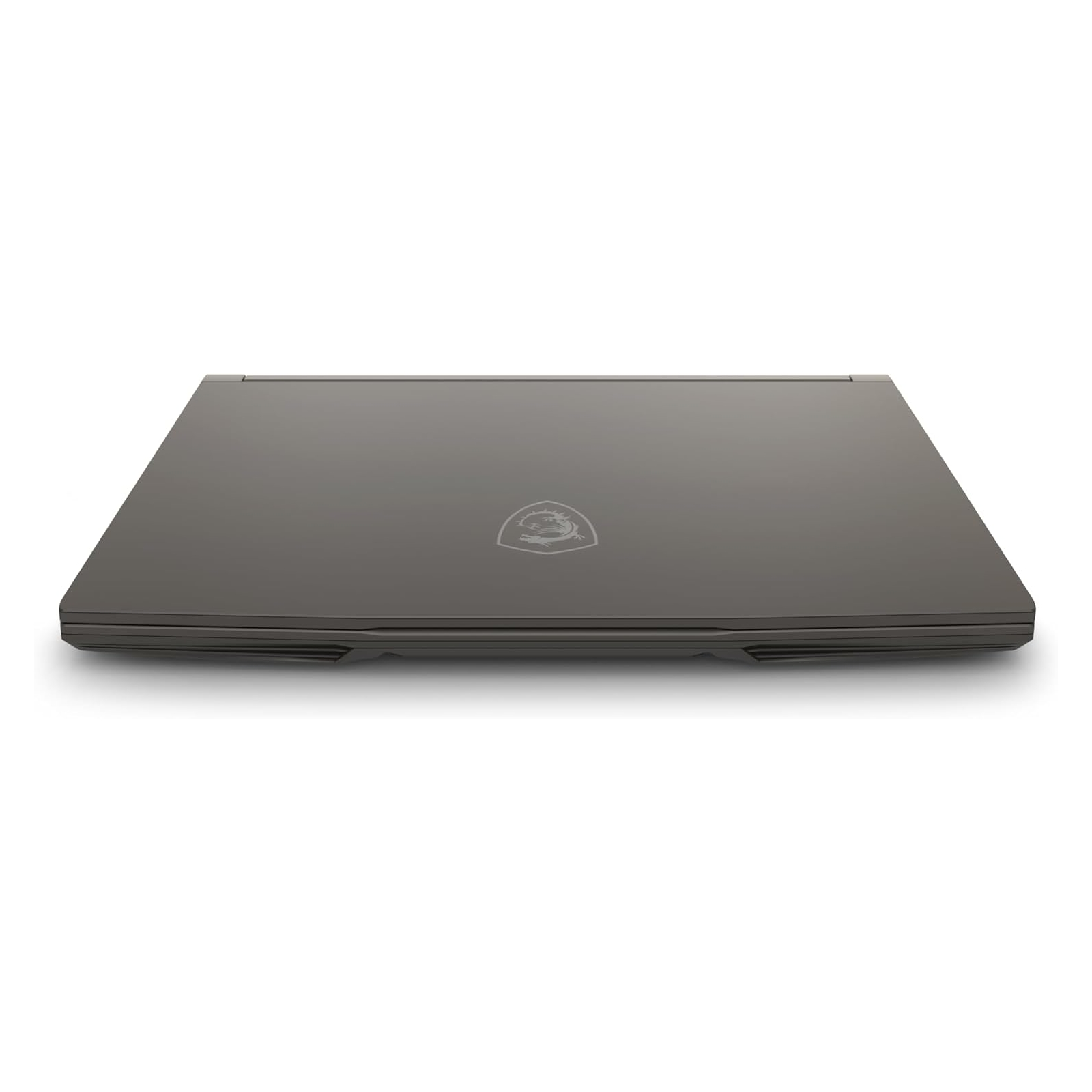 Laptop MSI chiuso su una superficie bianca, con logo sul coperchio.