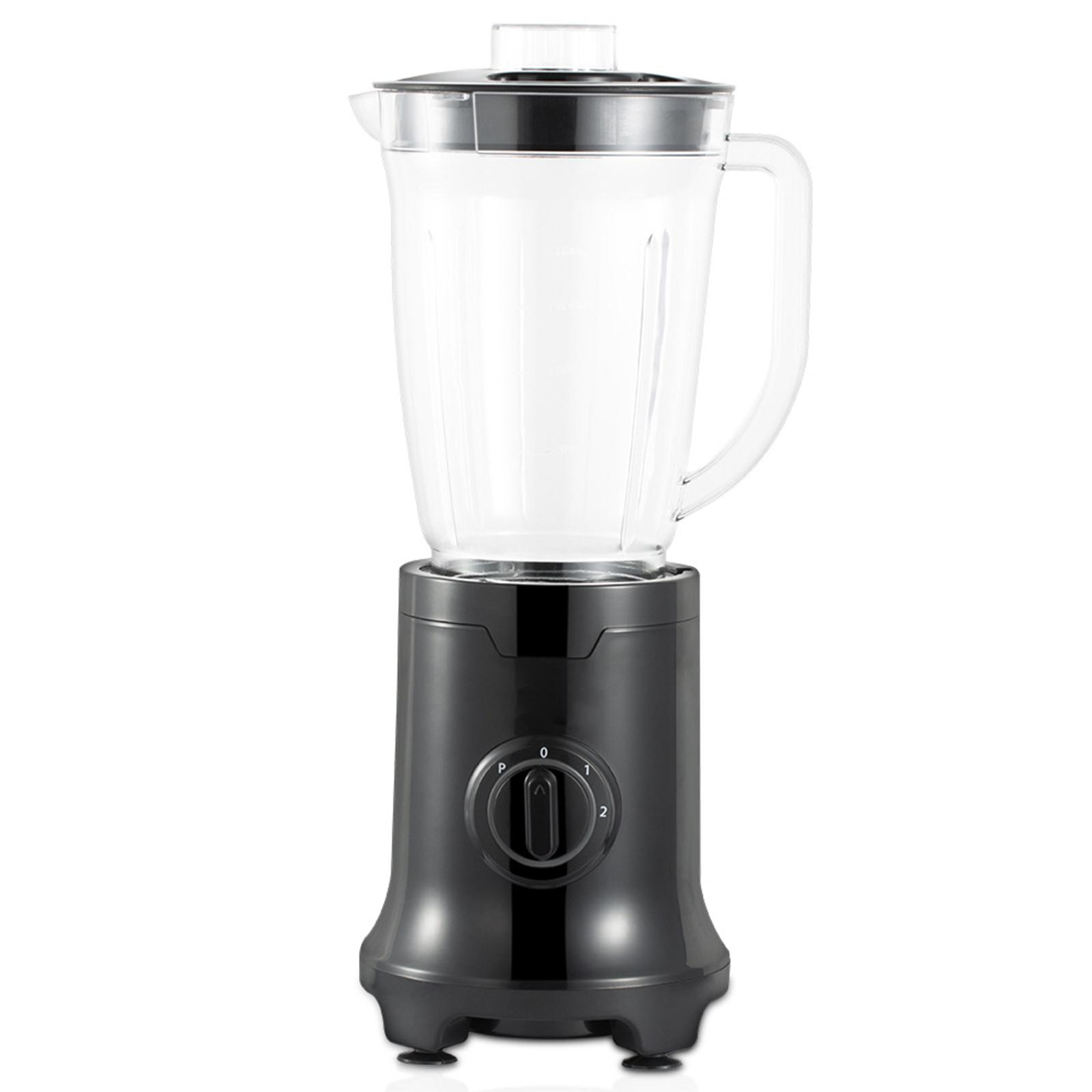 Schwarzer Mixer mit einem transparenten Krug. Der Mixer hat einen Drehregler und steht auf einer weißen Oberfläche.