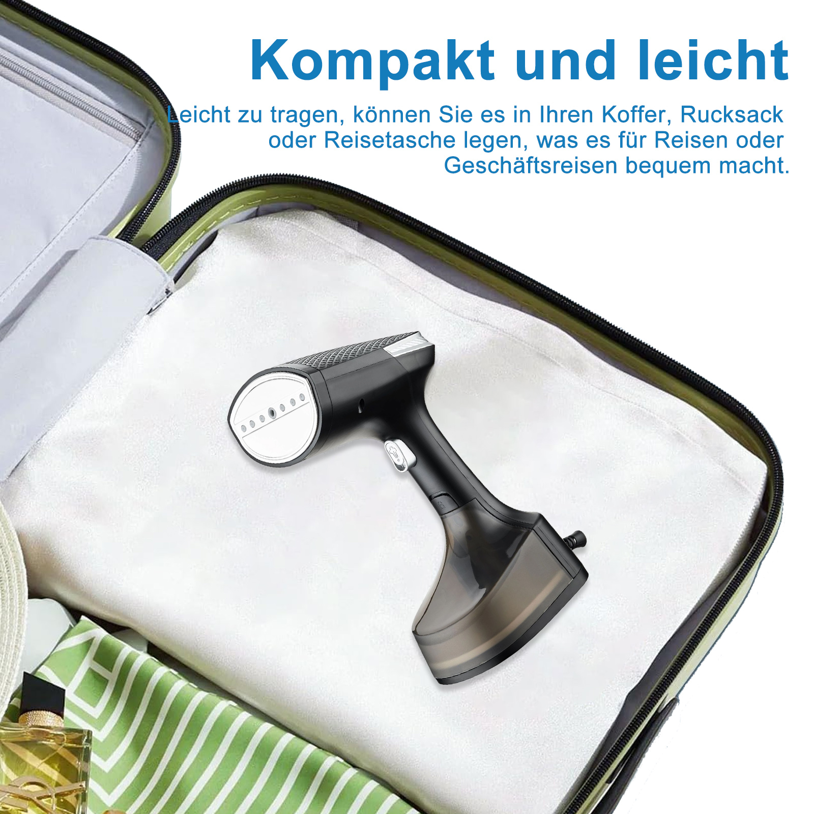 Handdampfgarer in einem grünen Koffer. Der Dampfgarer ist schwarz und weiß.
