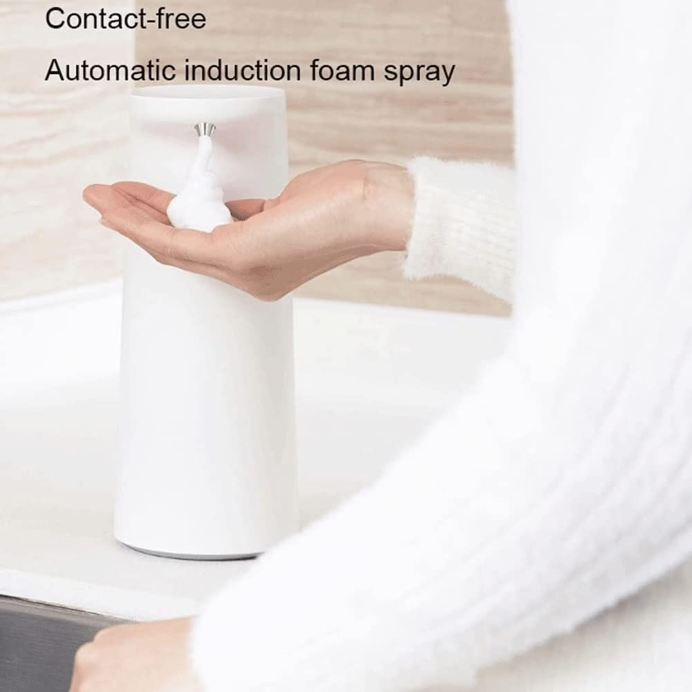Eine Hand empfängt Schaum von einem weißen, automatischen Schaumspray-Seifenspender. Text: Kontaktlos, Automatisches Induktions-Schaumspray.