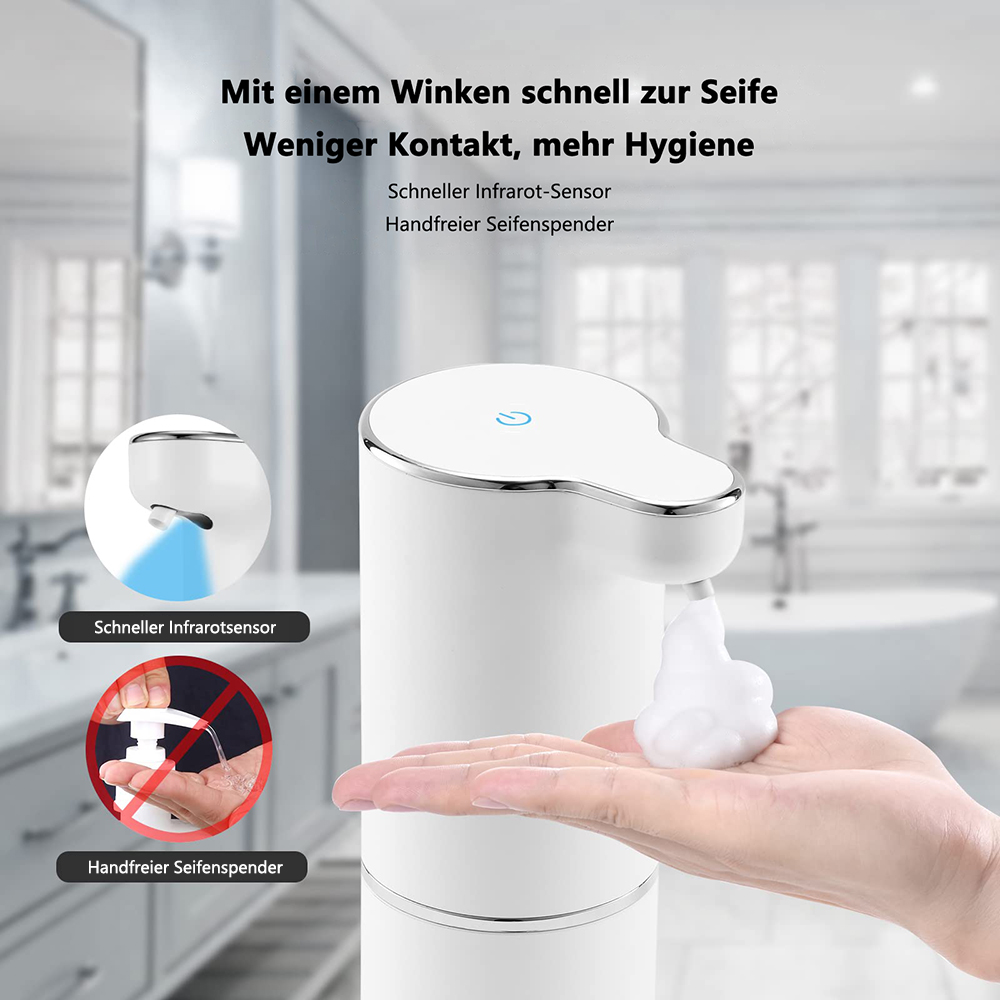 Weißer, automatischer Seifenspender gibt Schaum in eine Hand ab. Deutscher Text ist sichtbar.