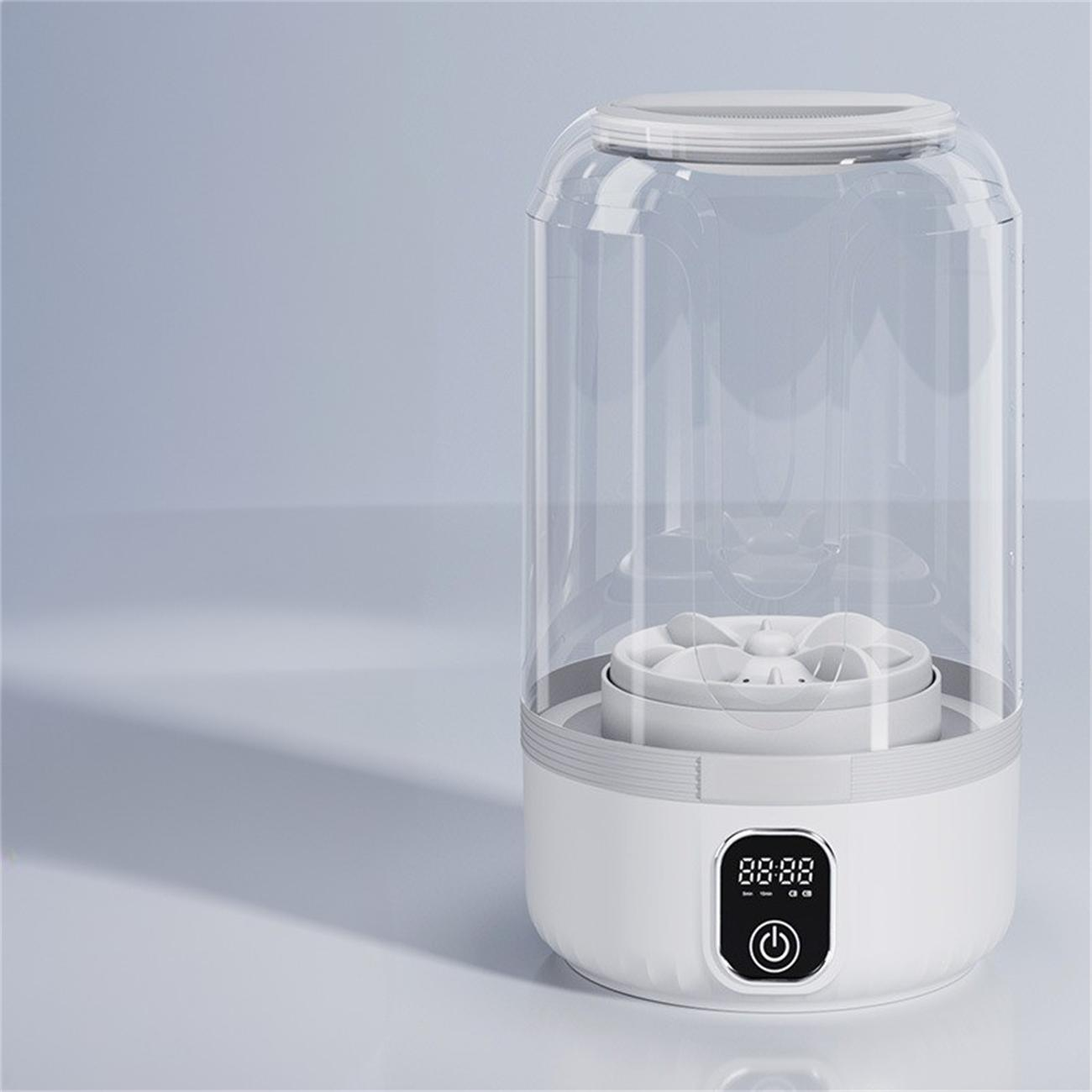 Ein weißes zylindrisches Gerät mit Digitalanzeige, möglicherweise ein Sterilisator, auf hellem Hintergrund.