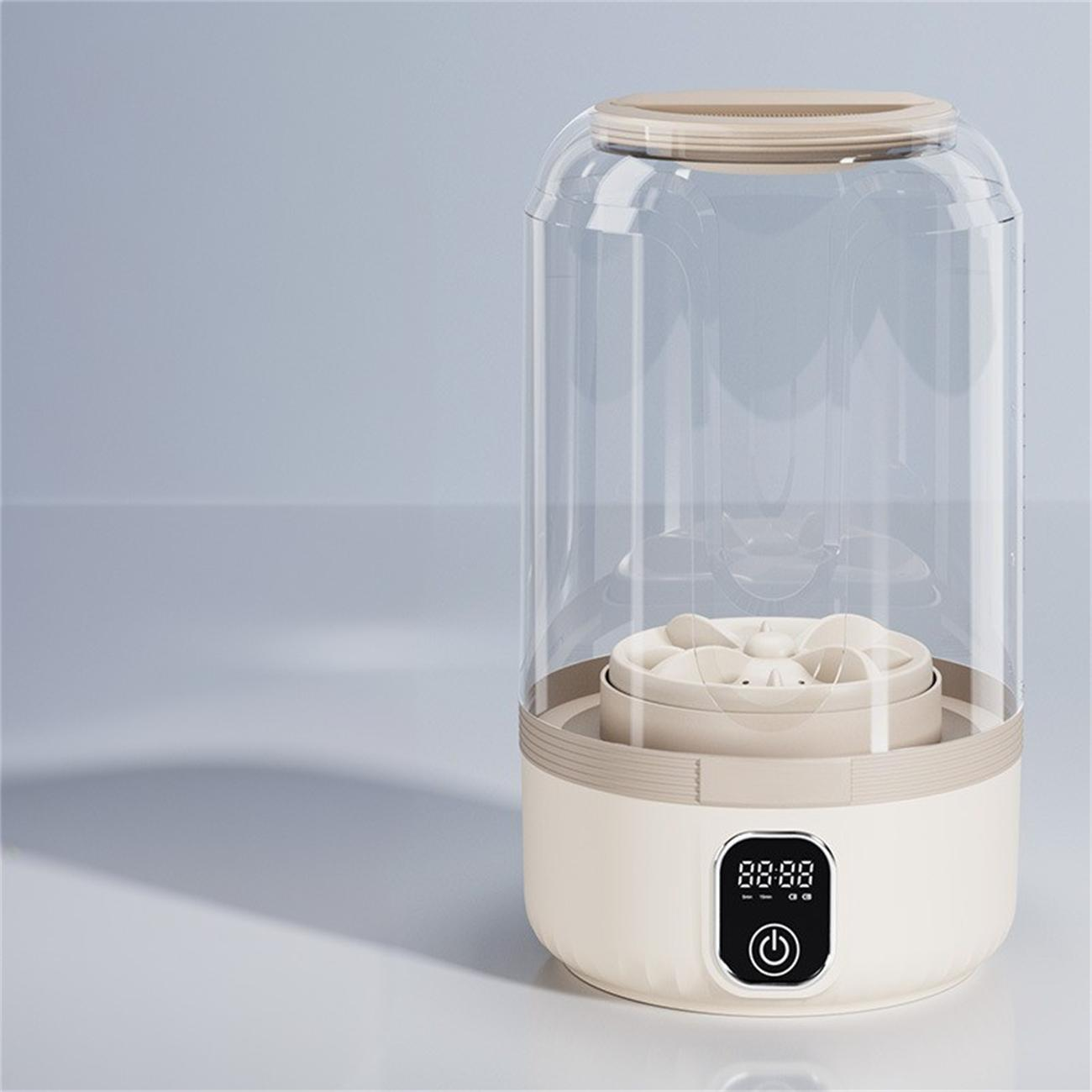 Ein Wasserreiniger mit weißer Basis, einem transparenten Zylinder, einem beigen Rand und einem Digitaldisplay.