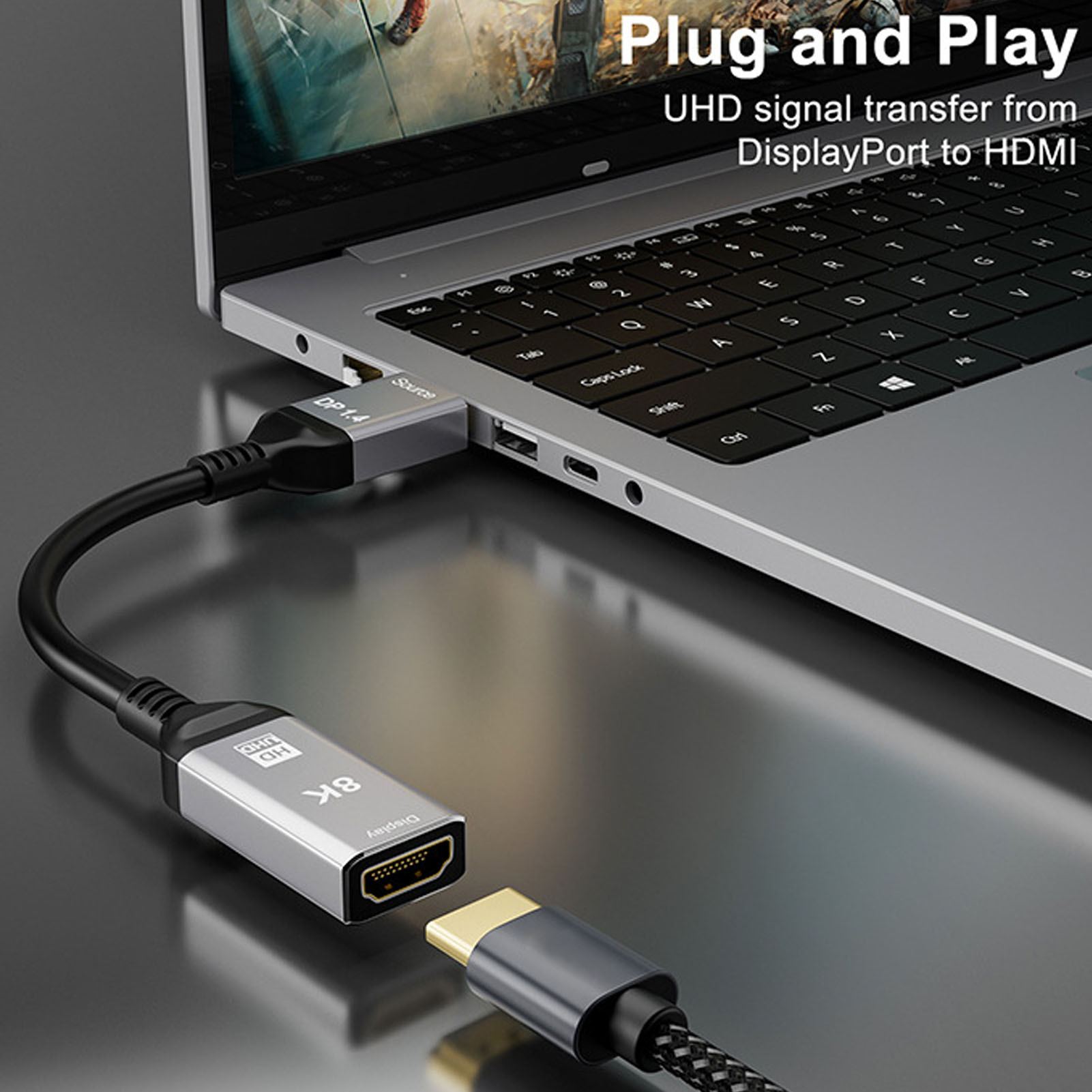 Ein Laptop, der über DisplayPort mit einem Display verbunden ist. Ein HDMI-Kabel ist am Laptop befestigt.