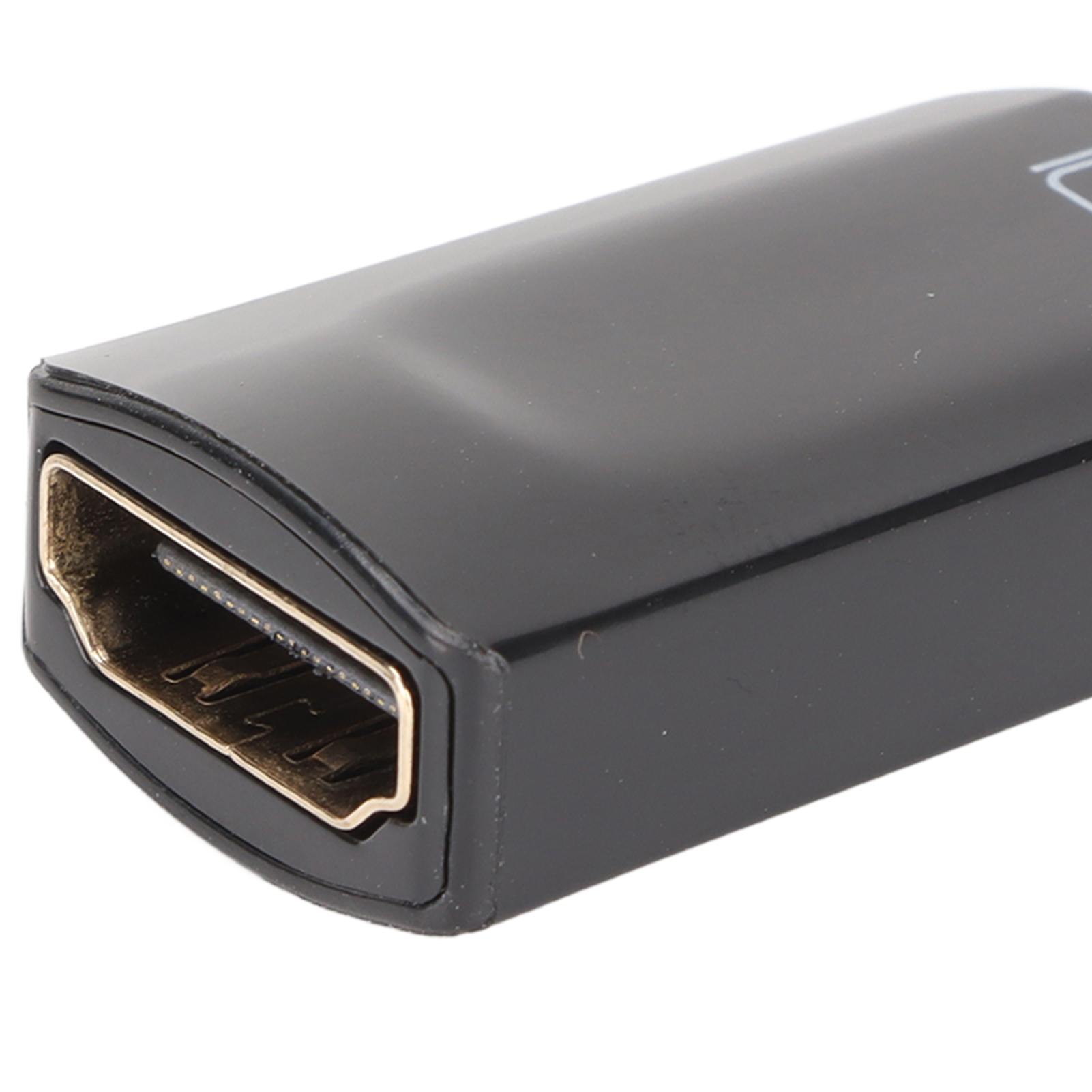 Nahaufnahme eines schwarzen Adapters mit HDMI-Anschluss.