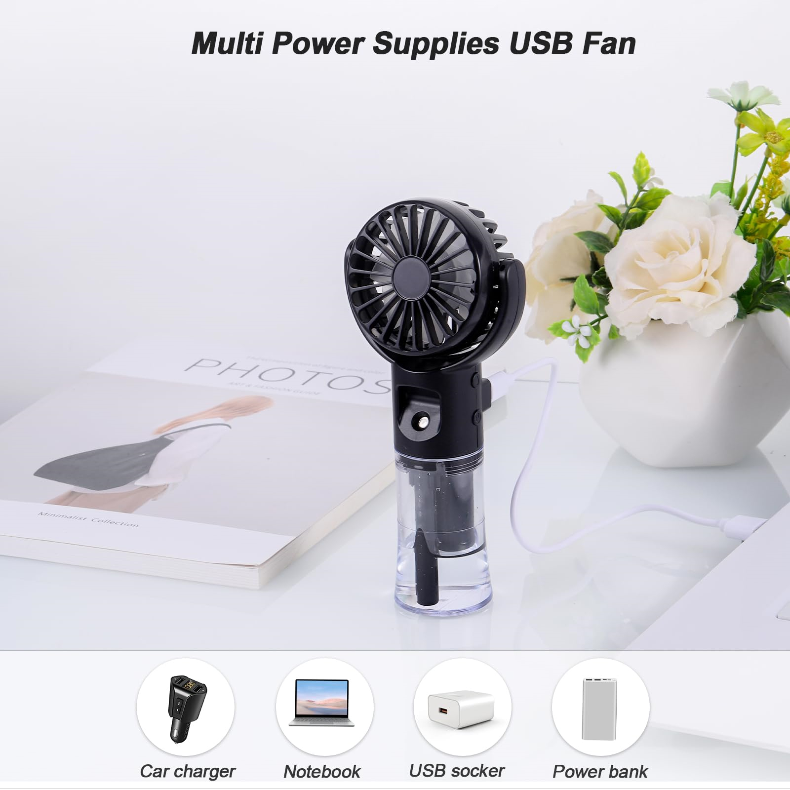 Ein kleiner Handventilator mit Wasserbehälter, neben einem Laptop und einer Powerbank. Der Text sagt Multi Power Supplies.