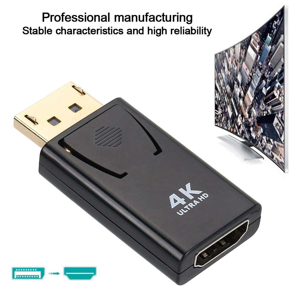 Ein schwarzer 4K Ultra HD Adapter mit goldenem Stecker, neben einem Fernsehbildschirm.