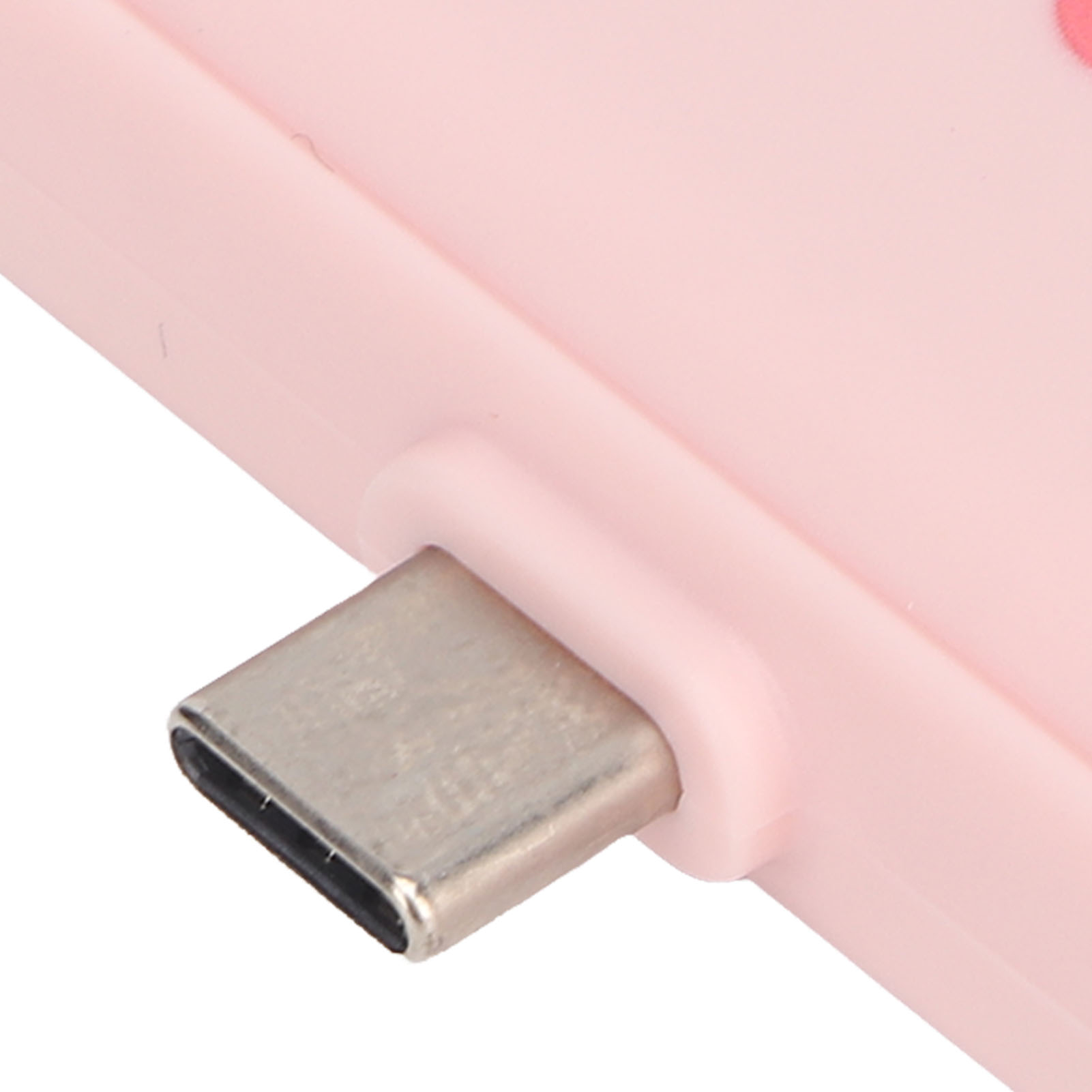 Nahaufnahme eines rosa USB-C-Anschlusses. Er ist in ein rosa Gerät eingesetzt.