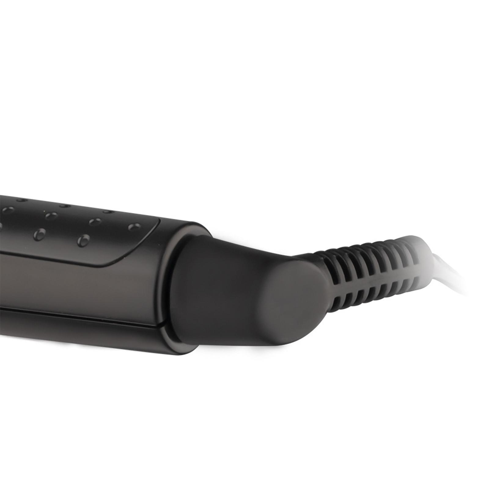Nahaufnahme des schwarzen Griffs eines Haarglätters. Das Kabel ist sichtbar.